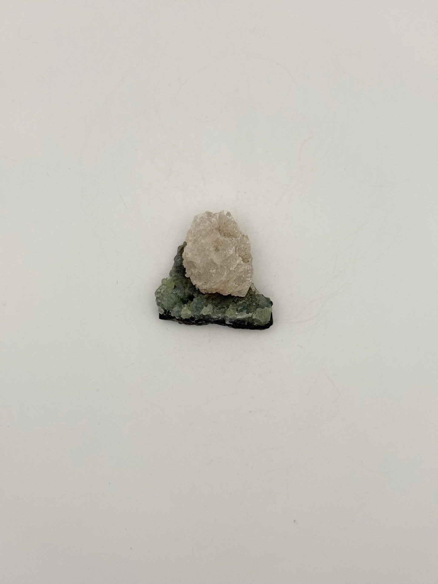 Raw prehnite specimen with amazing green color.