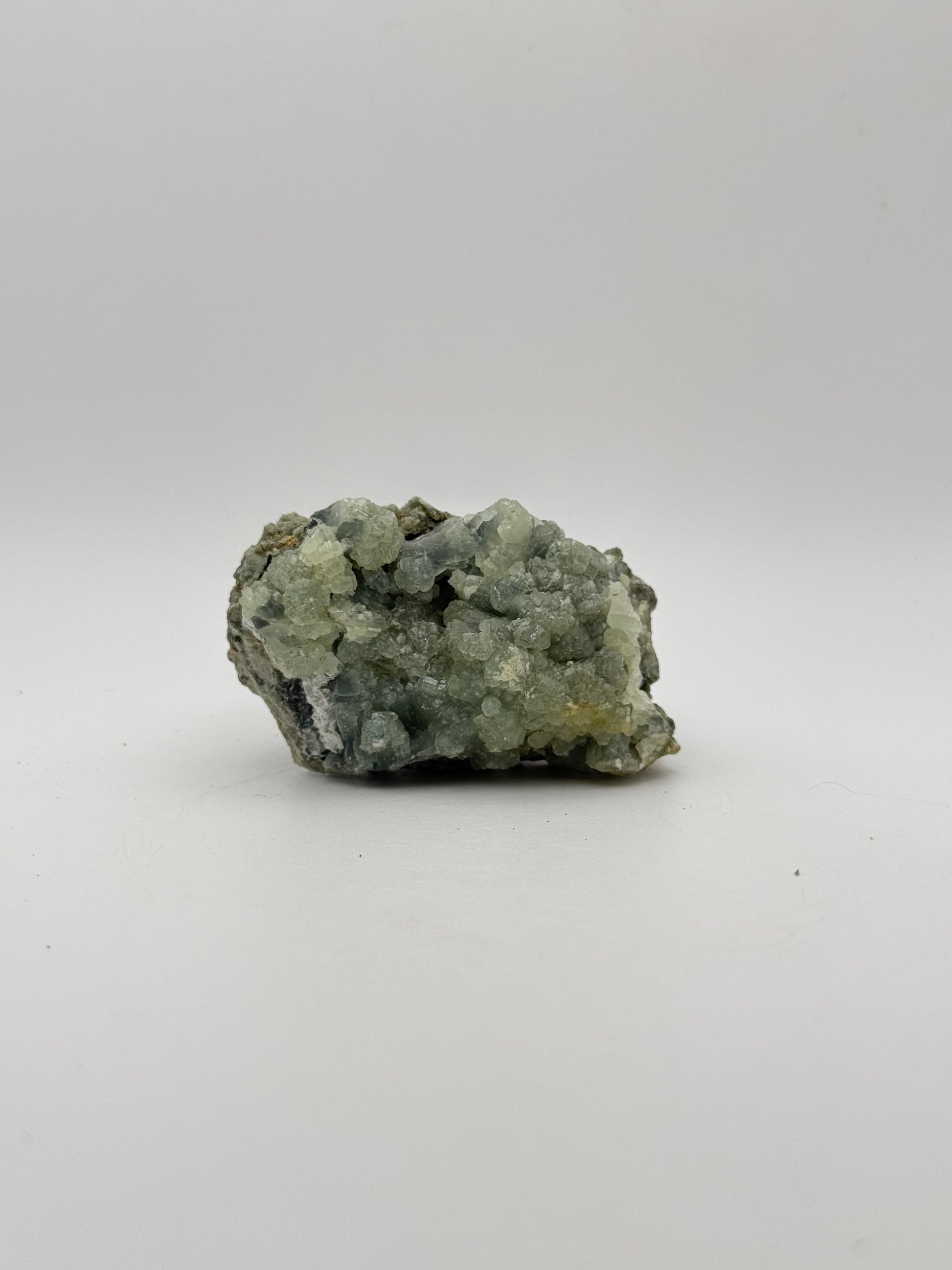 Raw prehnite specimen with amazing green color.
