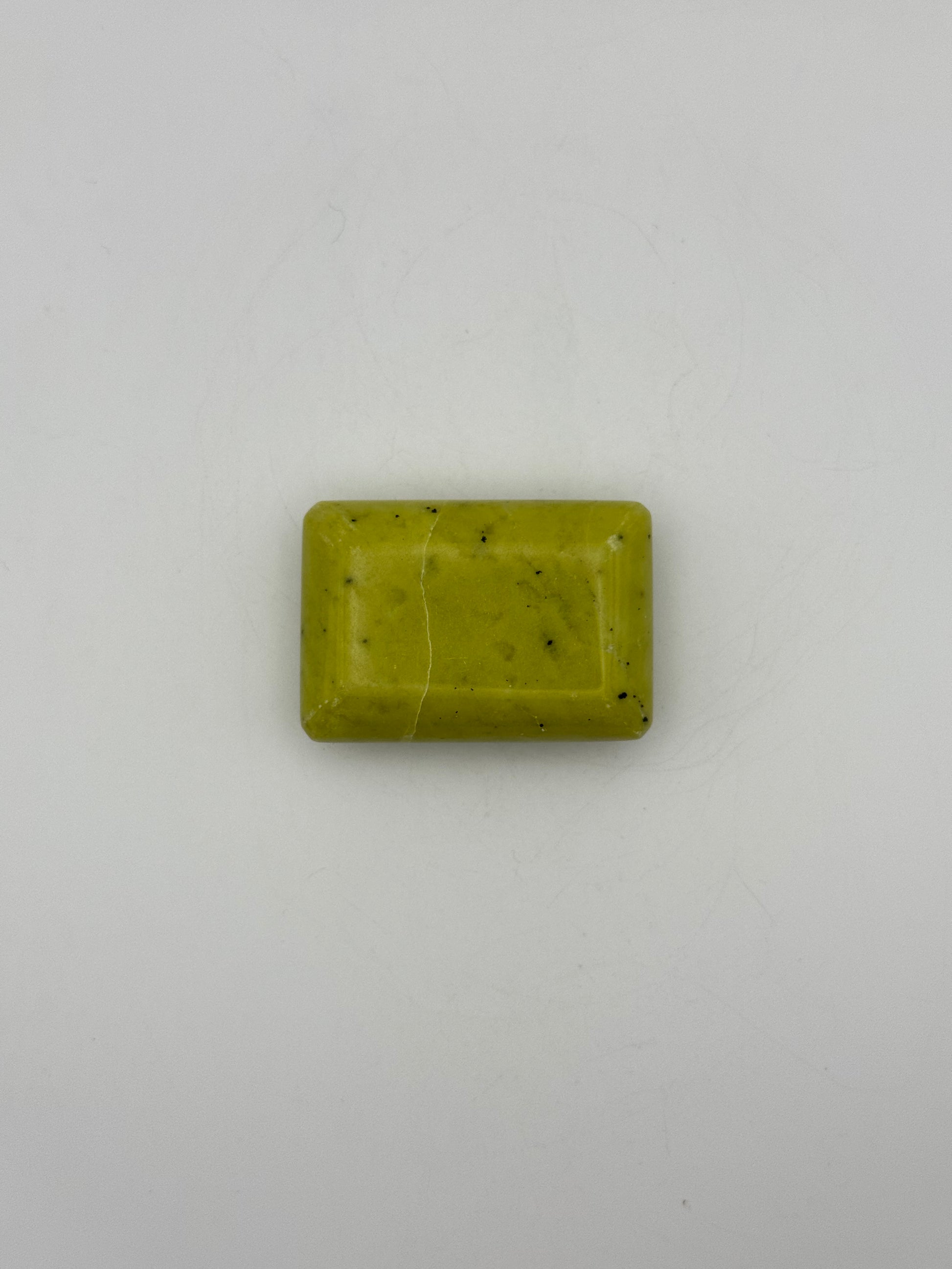 Polished healerite in the shape of a rectangular soap.