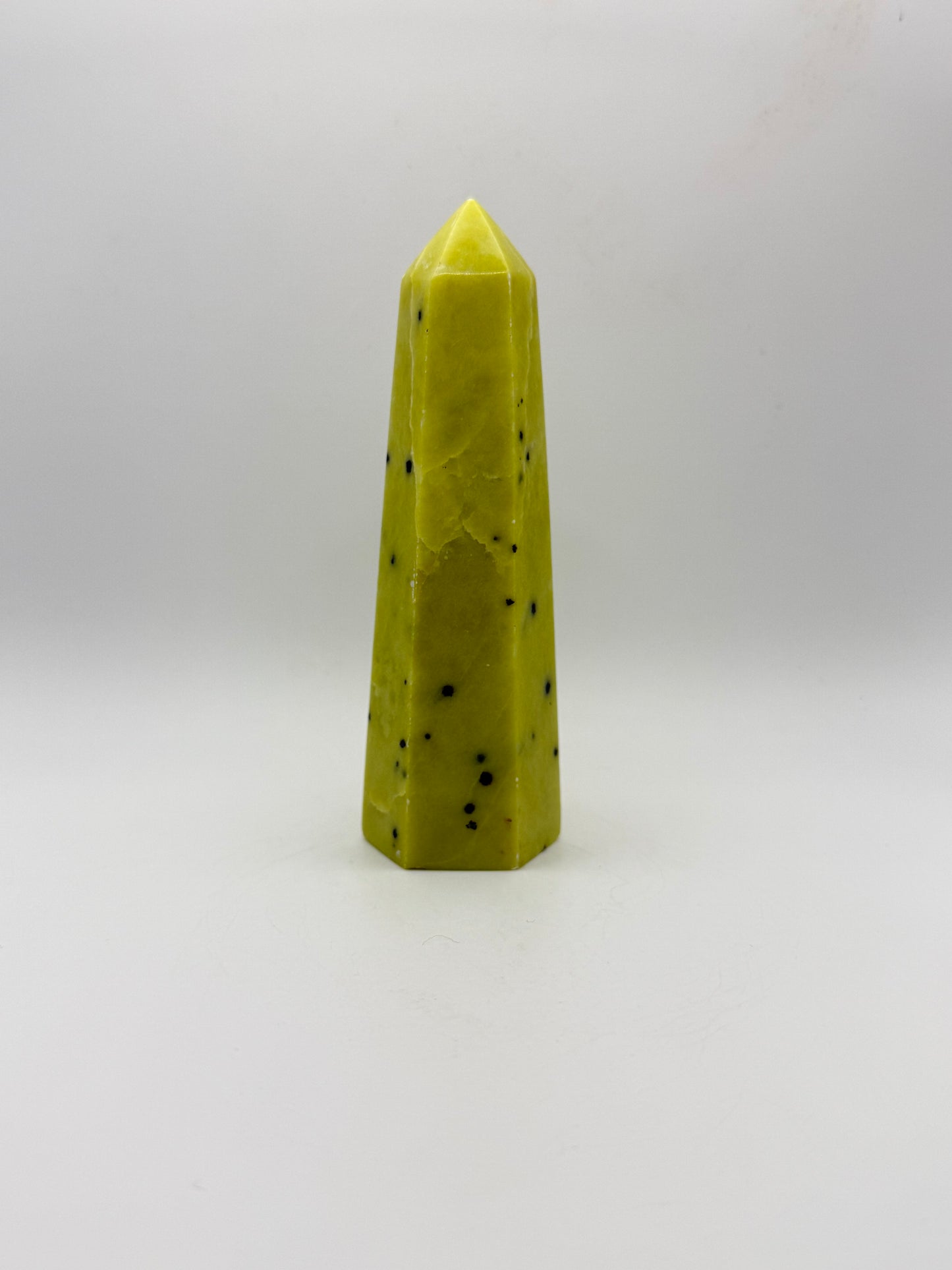 Polished healerite six sided tower.