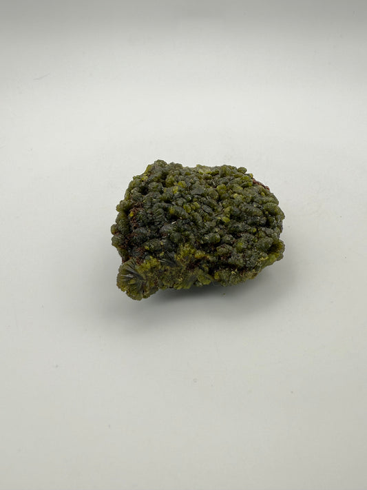 Epidote crystal cluster with good green color.