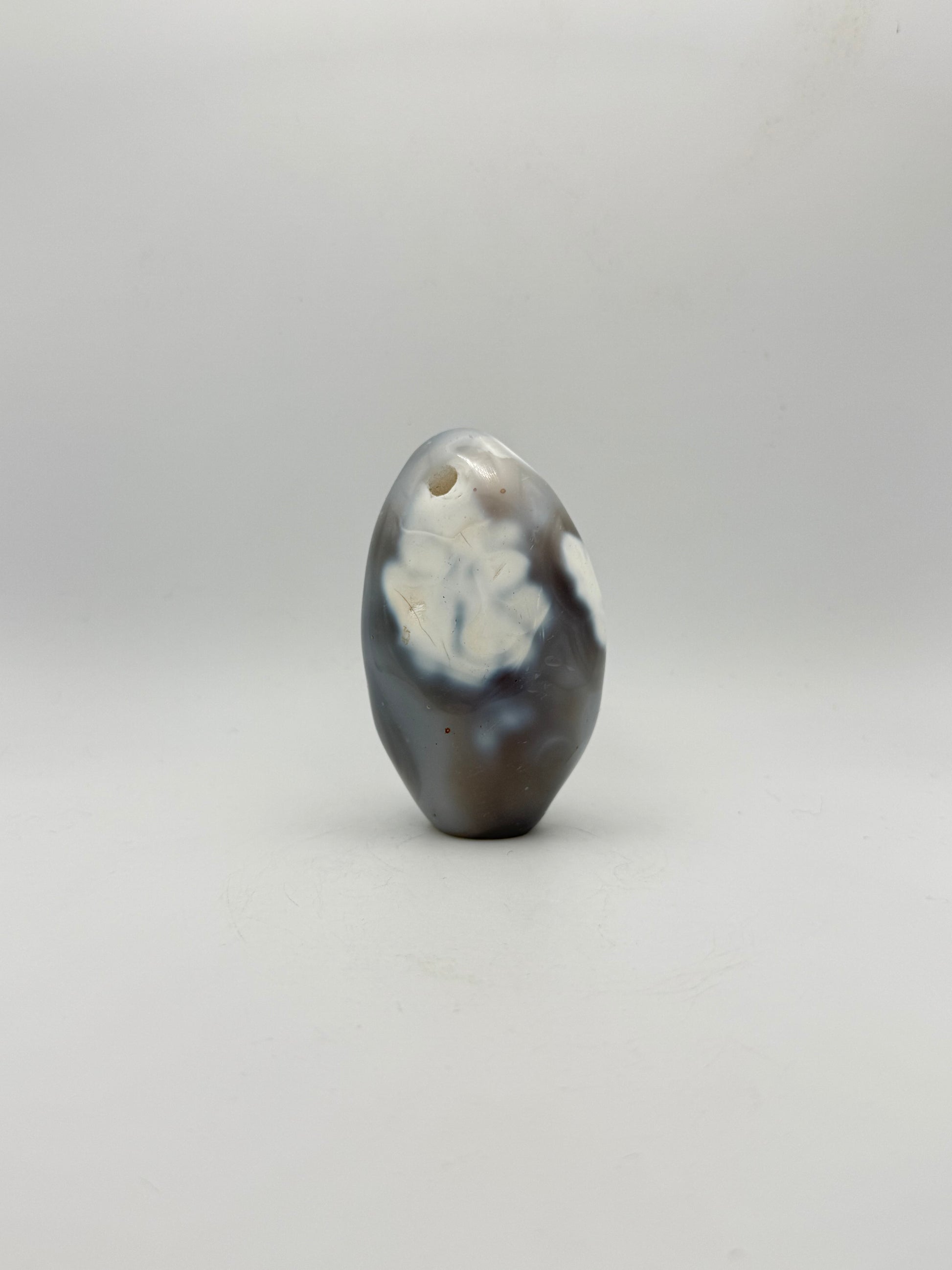 Polished orca agate free form.