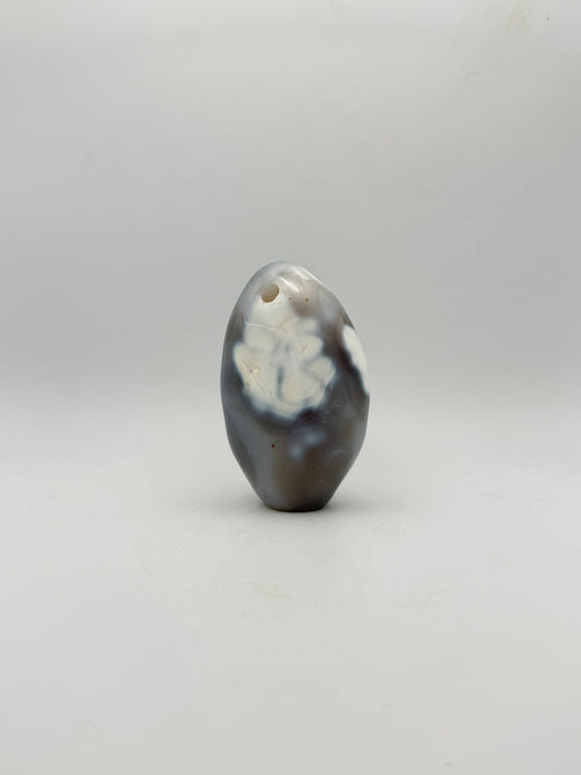 Polished orca agate free form.