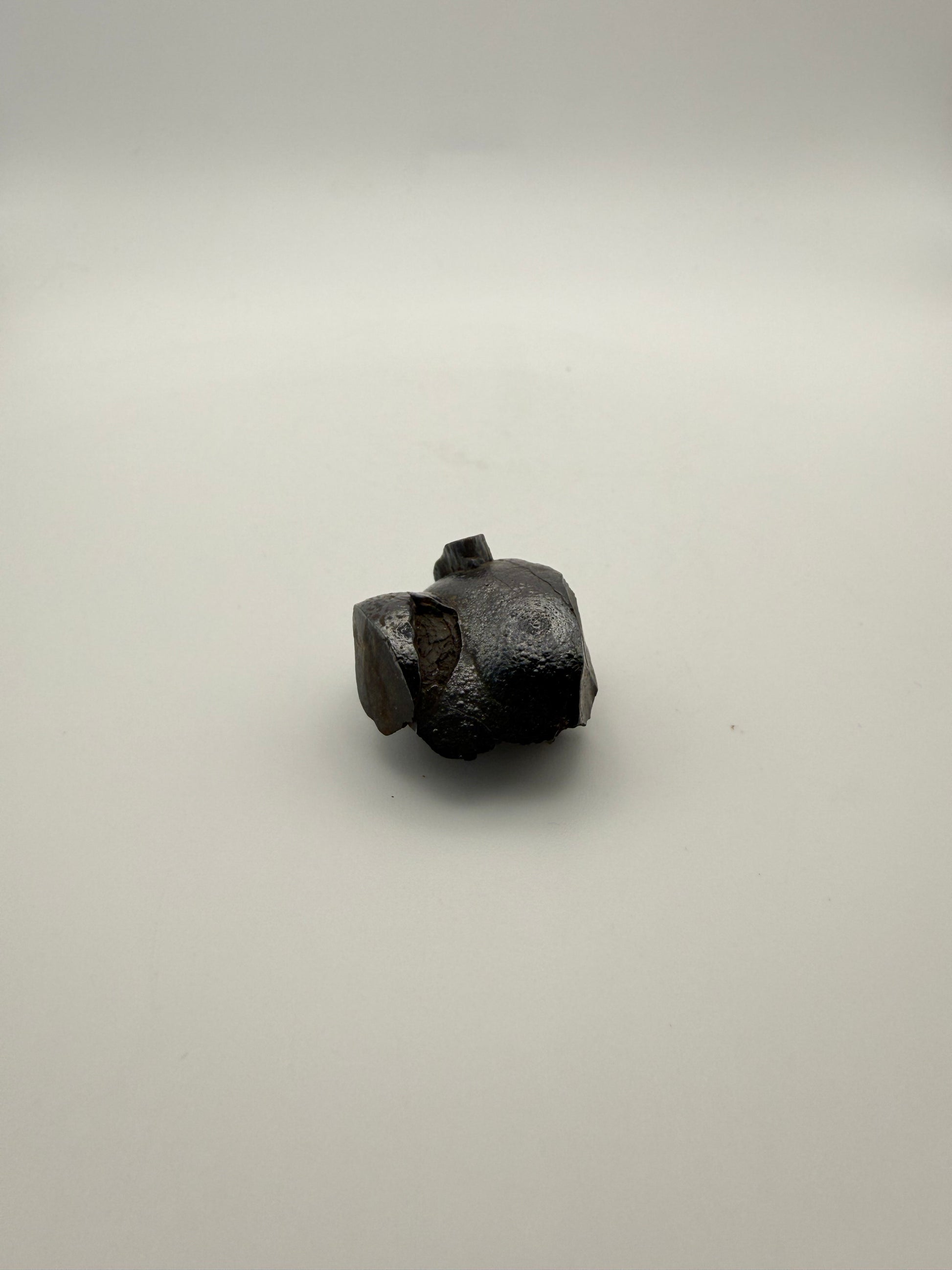 Small raw hematite specimen.