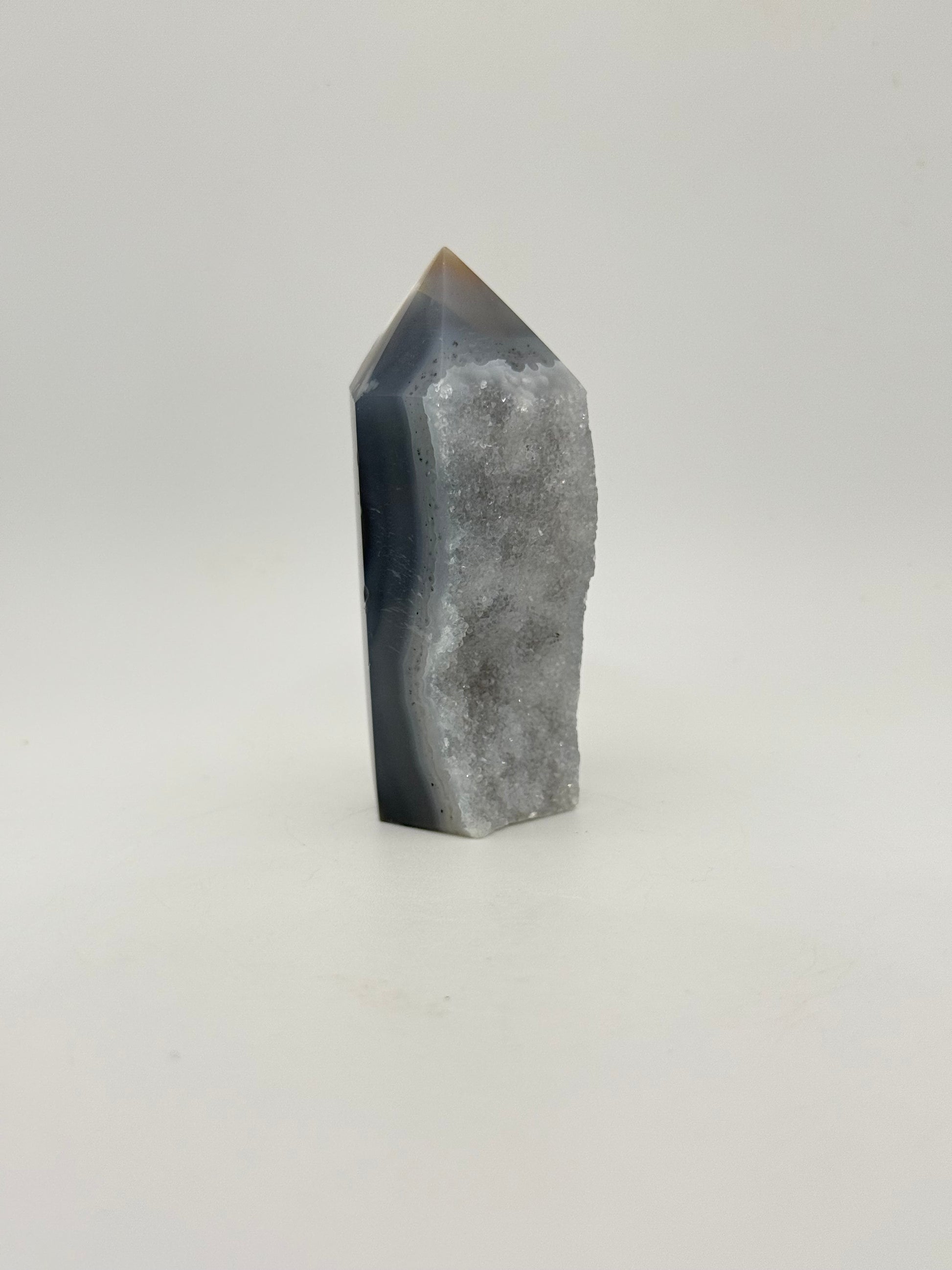 Polished druzy agate tower. About 3  inches tall.