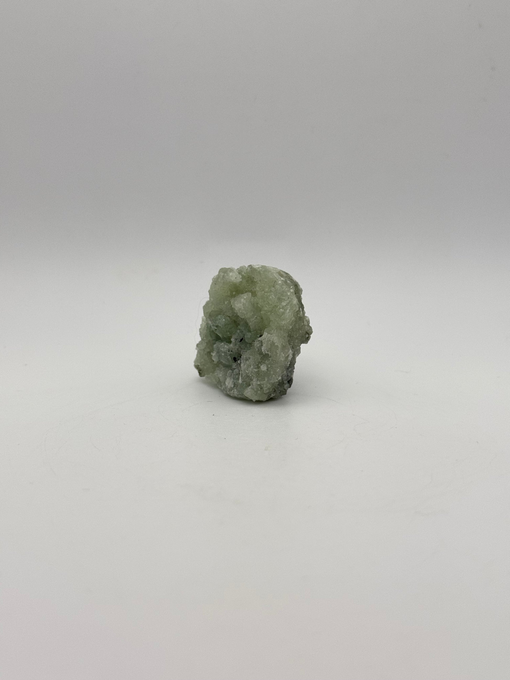 Raw prehnite specimen with amazing green color.
