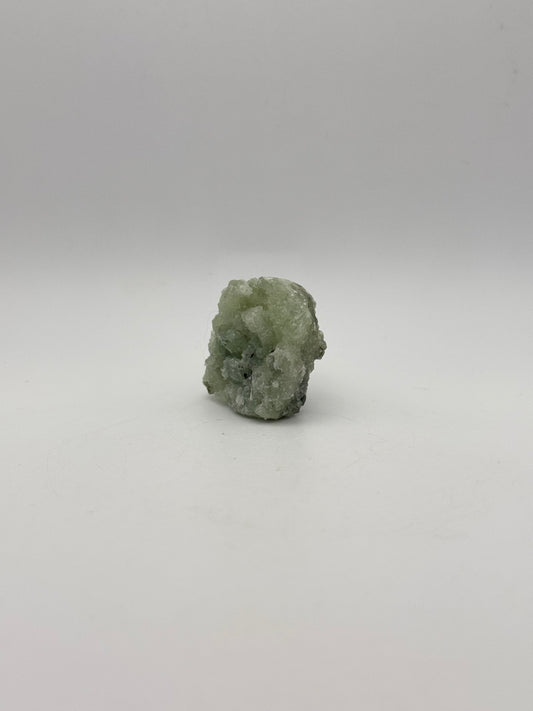 Raw prehnite specimen with amazing green color.