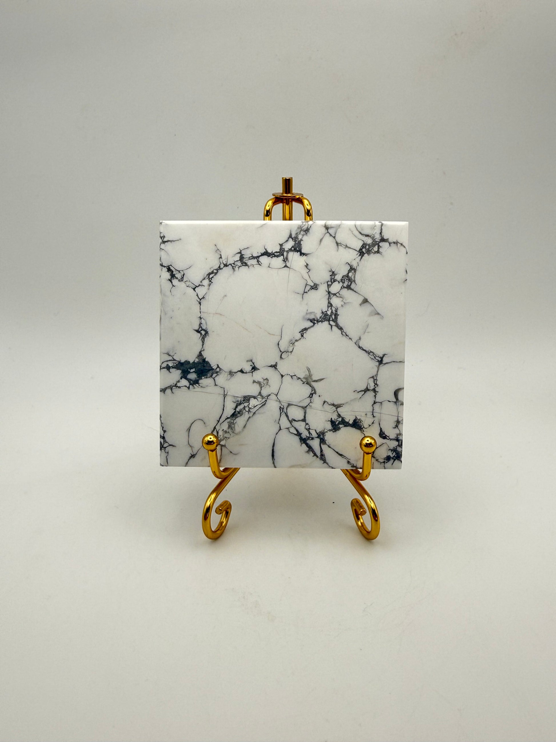 Polished howlite square tile.