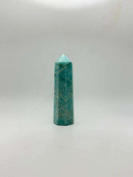Amazonite tower with eight sides, that is about 4inches tall with a width of 1 1/4inches.