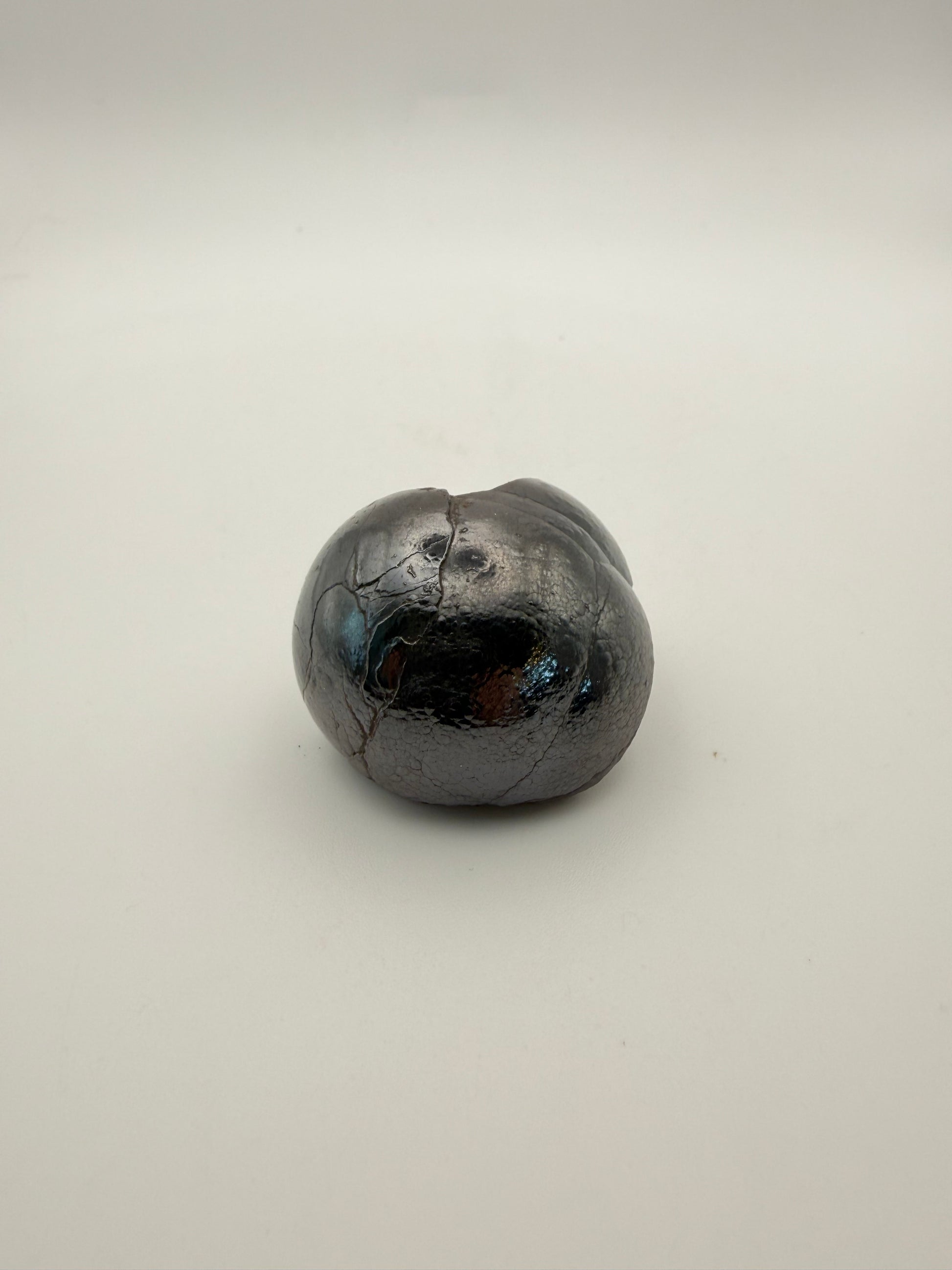 Small raw hematite specimen.