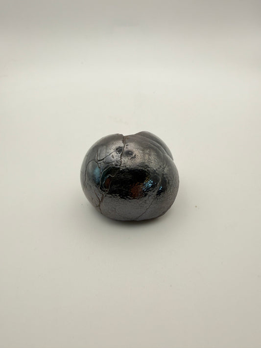 Small raw hematite specimen.