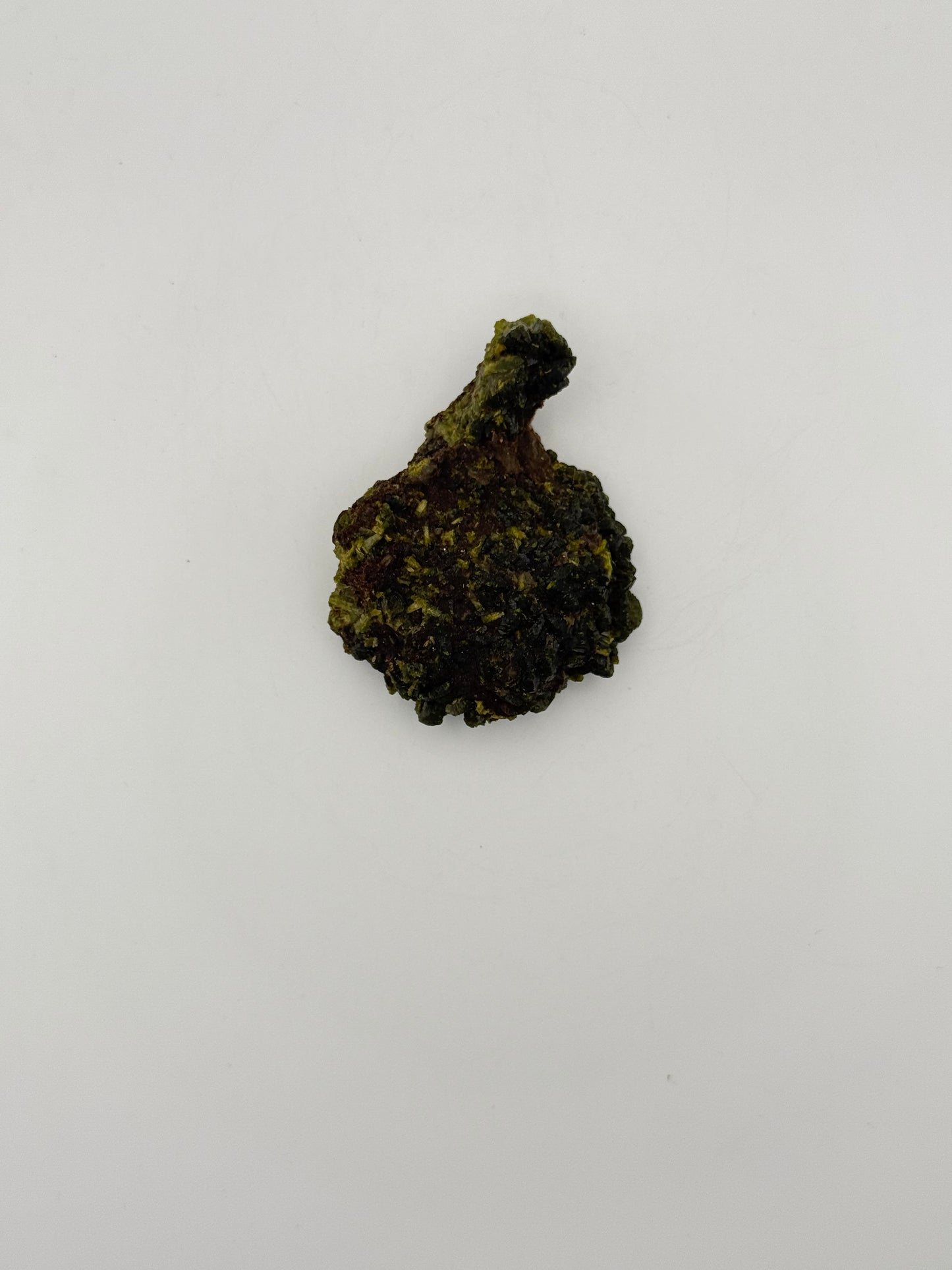 Epidote crystal cluster with good green color.