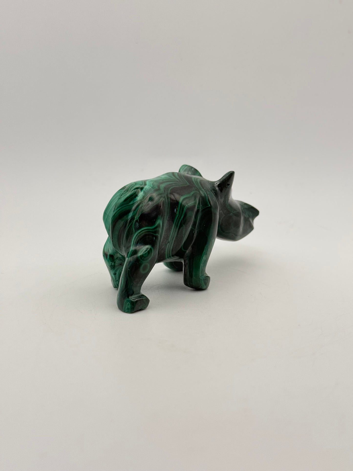 Malachite rhino carving.
