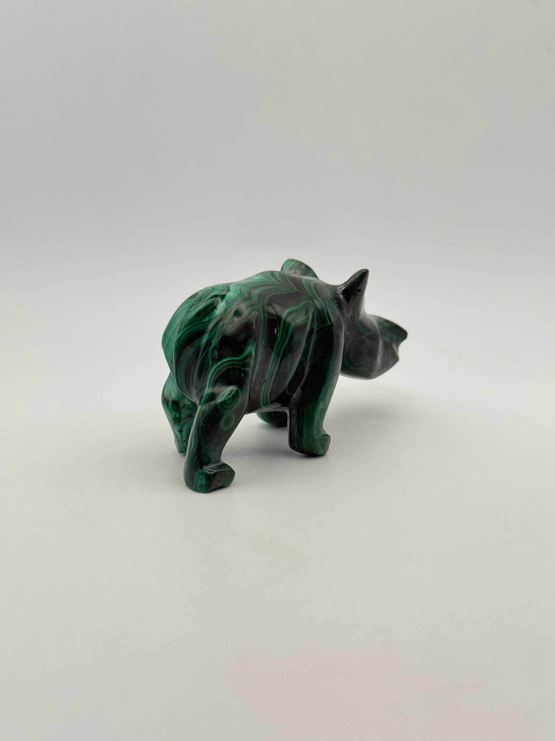 Malachite rhino carving.
