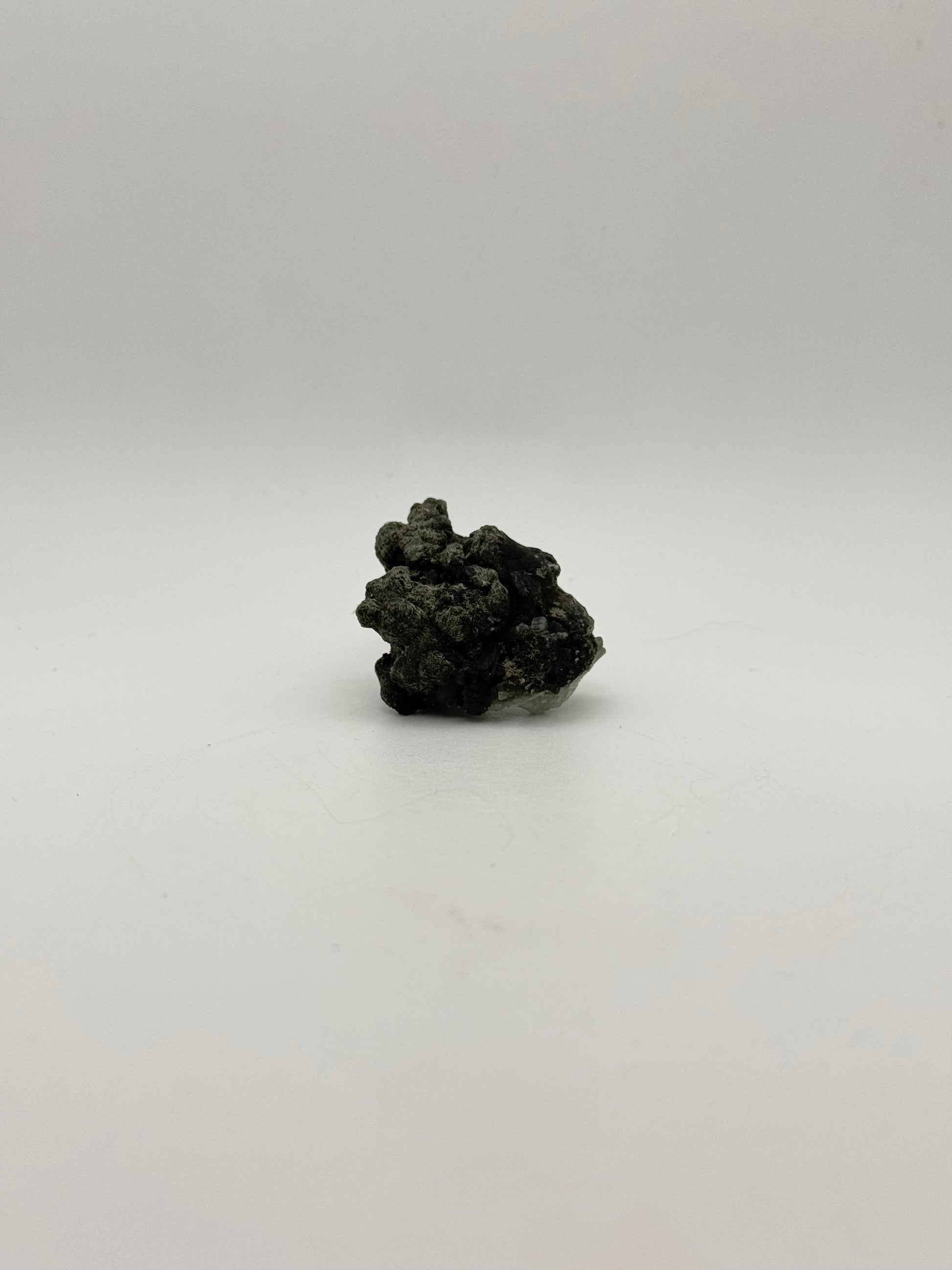 Raw prehnite specimen with amazing green color.