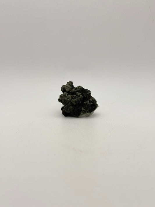 Raw prehnite specimen with amazing green color.