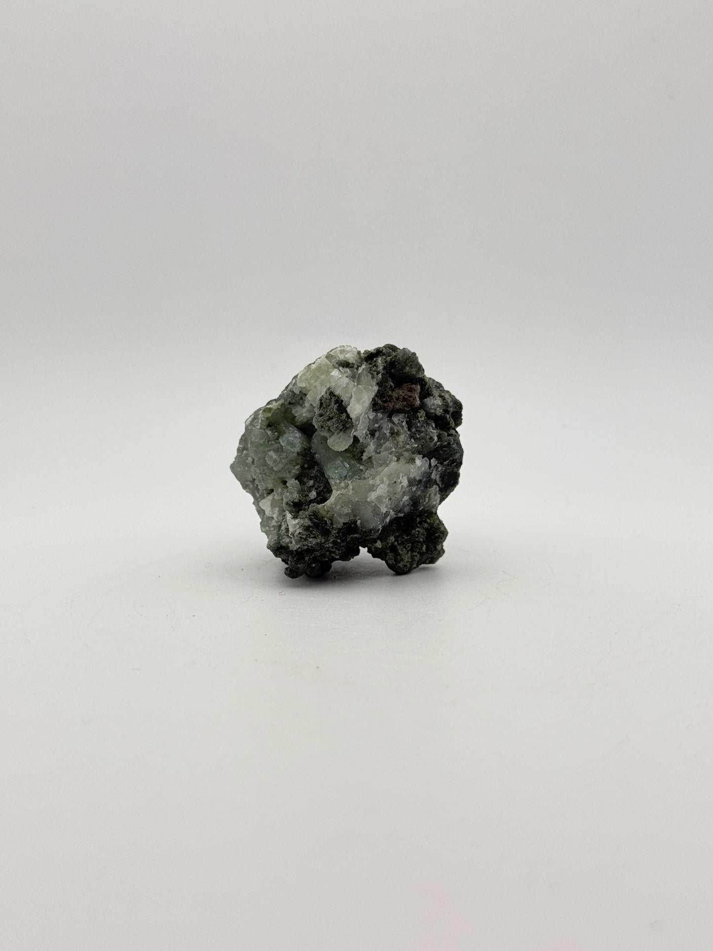 Raw prehnite specimen with amazing green color.