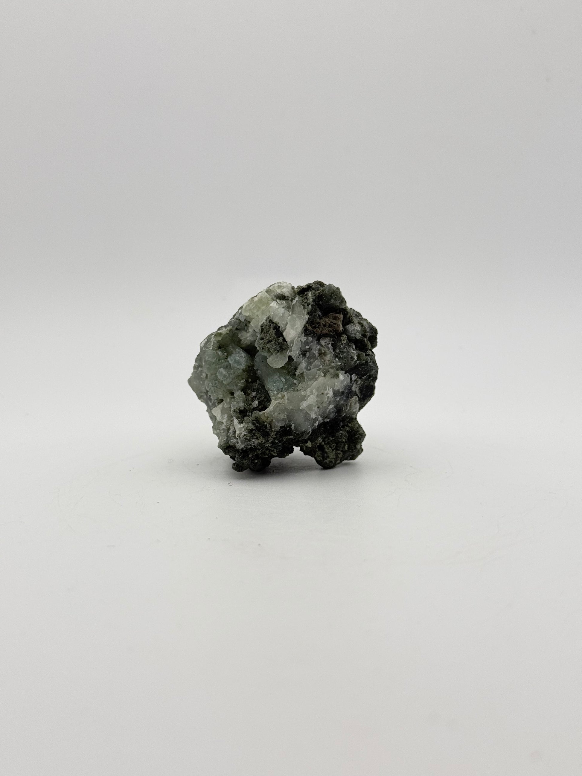 Raw prehnite specimen with amazing green color.