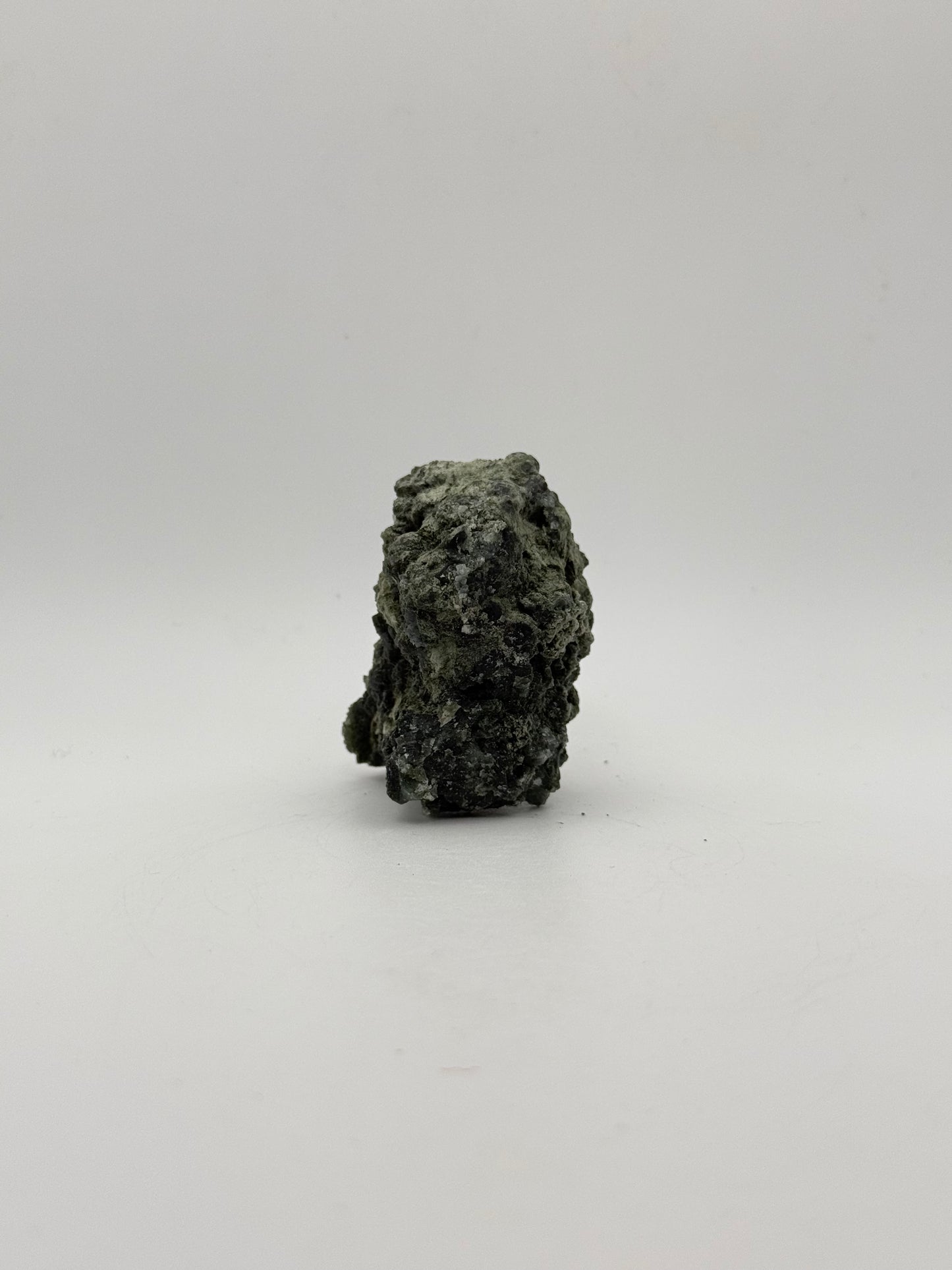 Raw prehnite specimen with amazing green color.