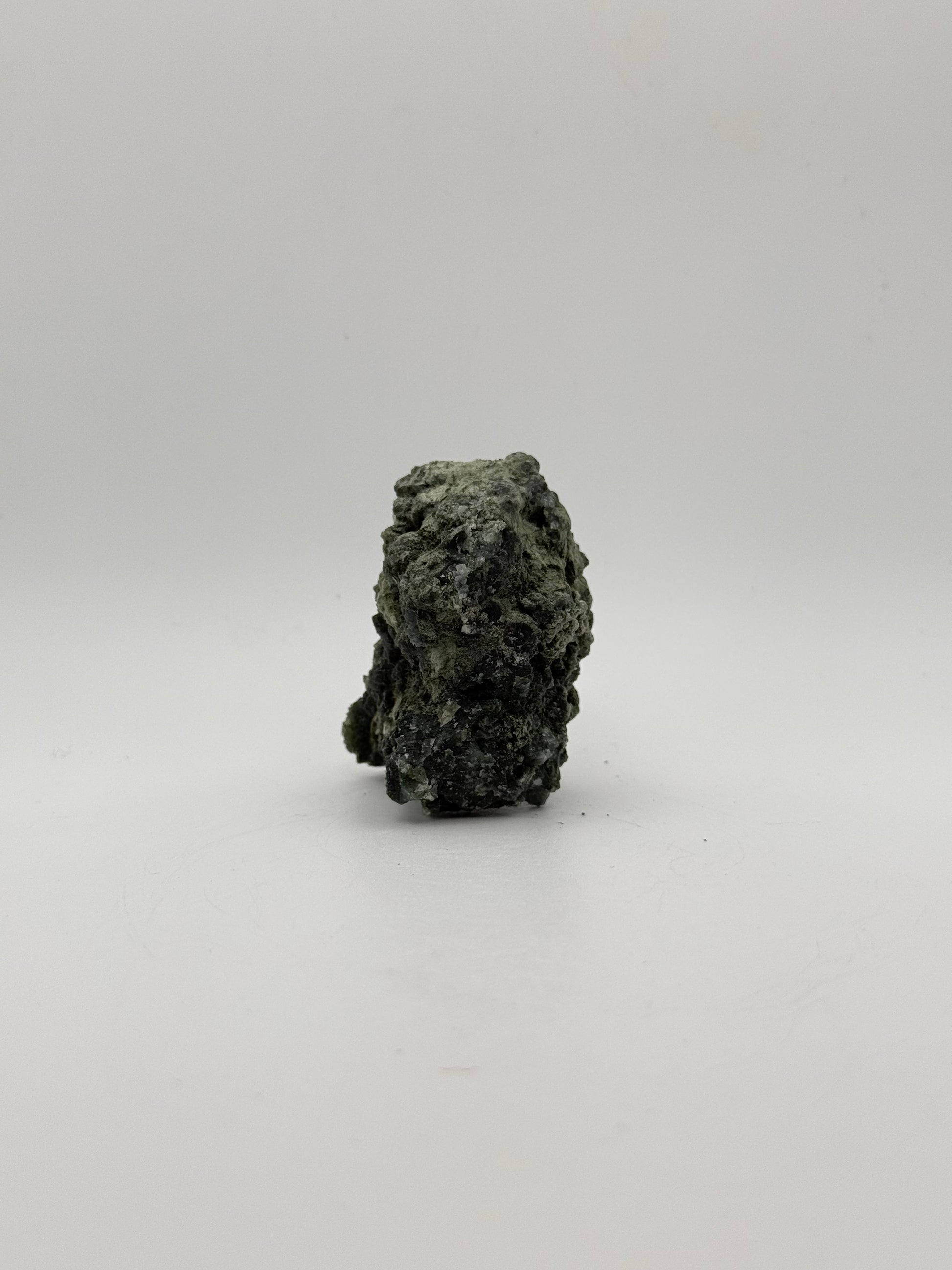 Raw prehnite specimen with amazing green color.