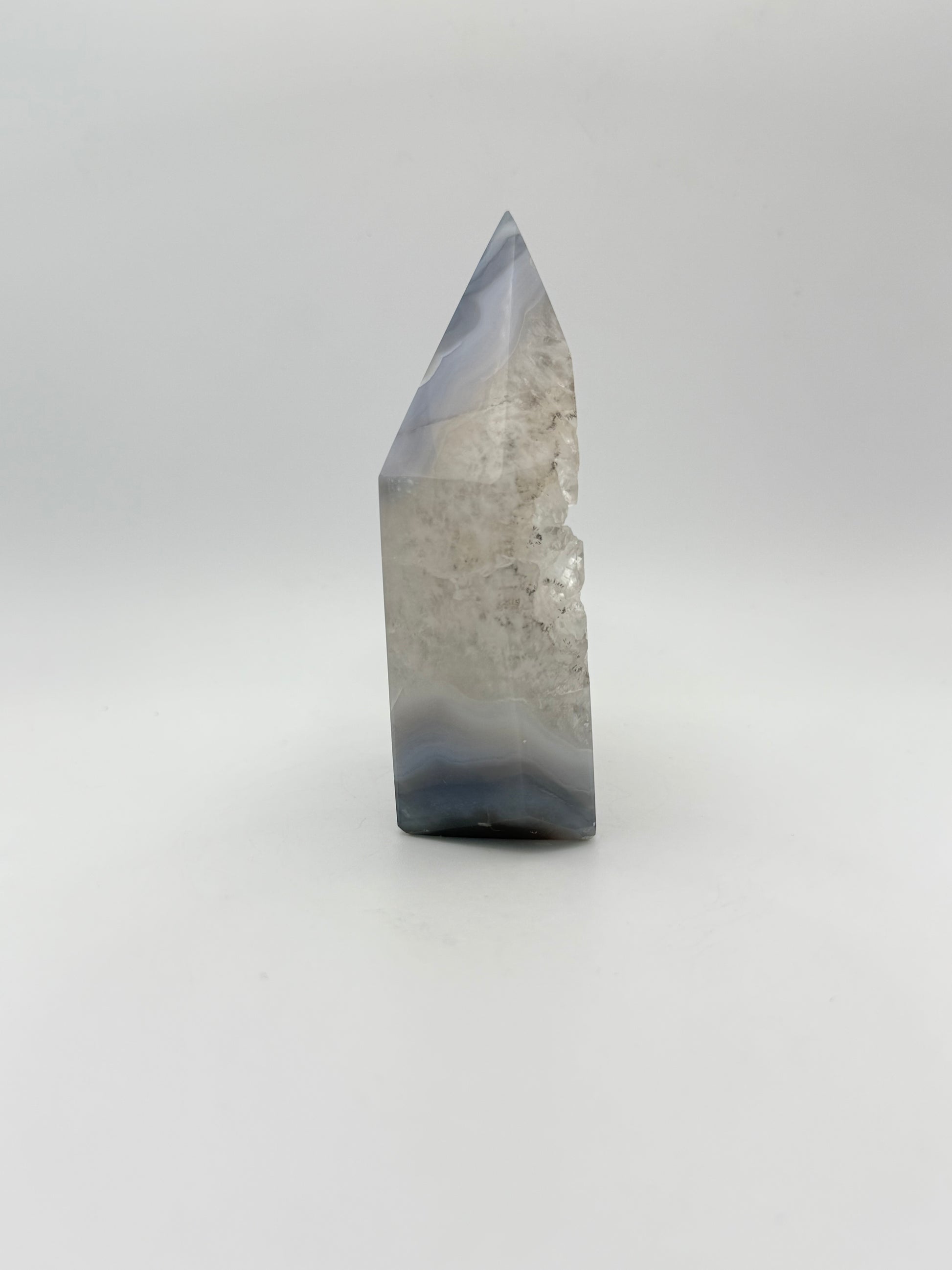 Polished druzy agate tower. a little over 4 inches tall.