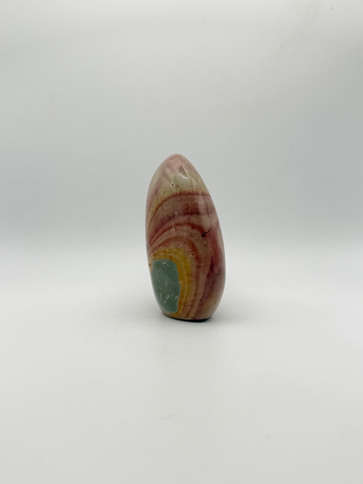 A polished polychrome jasper free from.