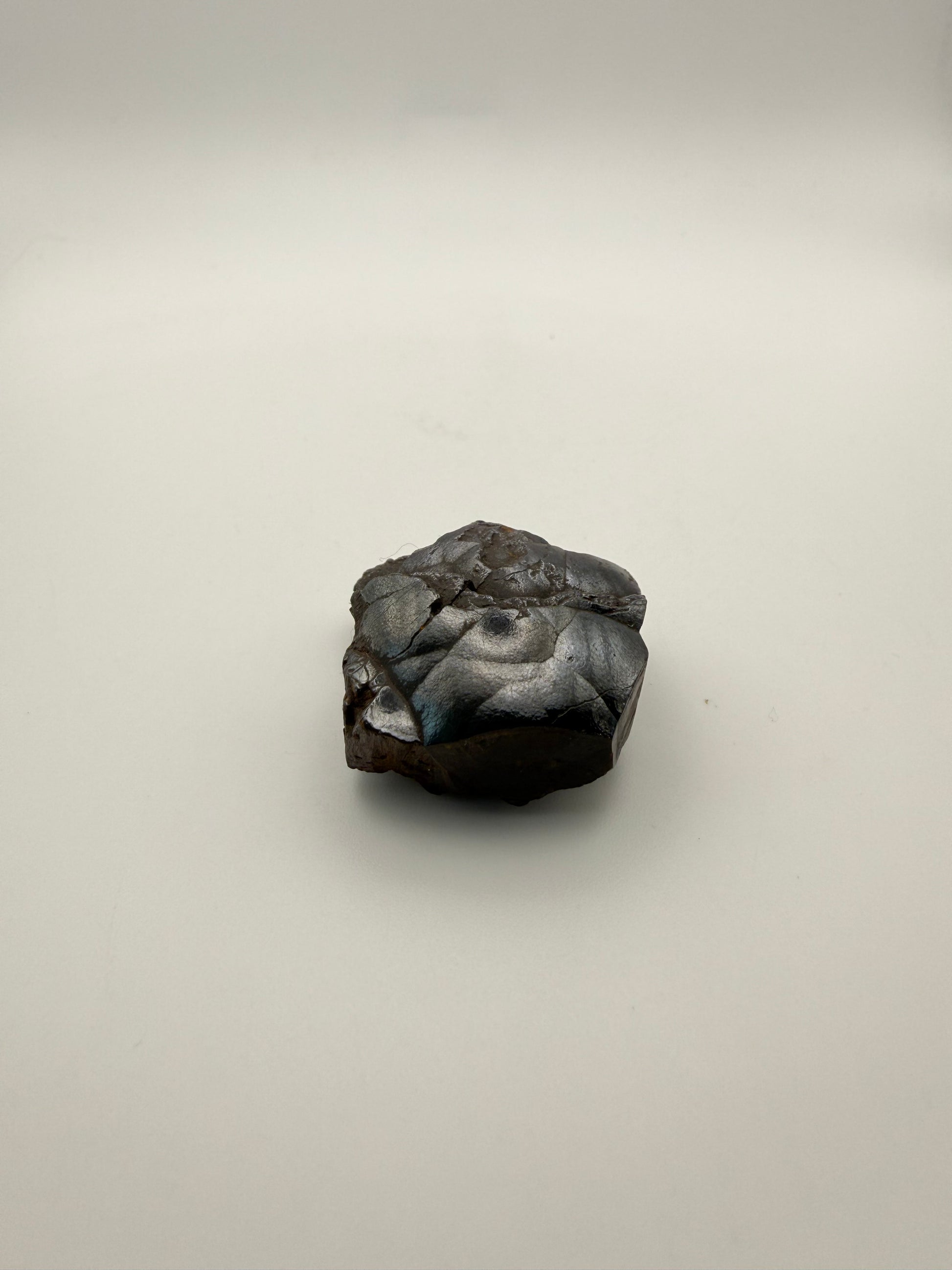 Small raw hematite specimen.