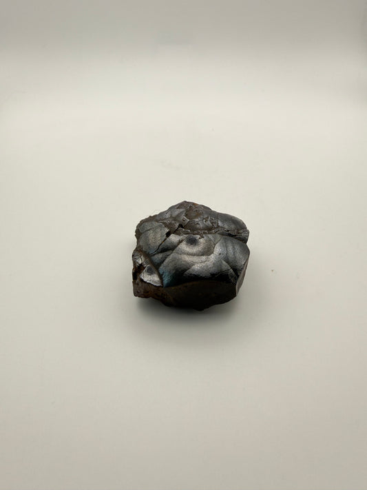 Small raw hematite specimen.