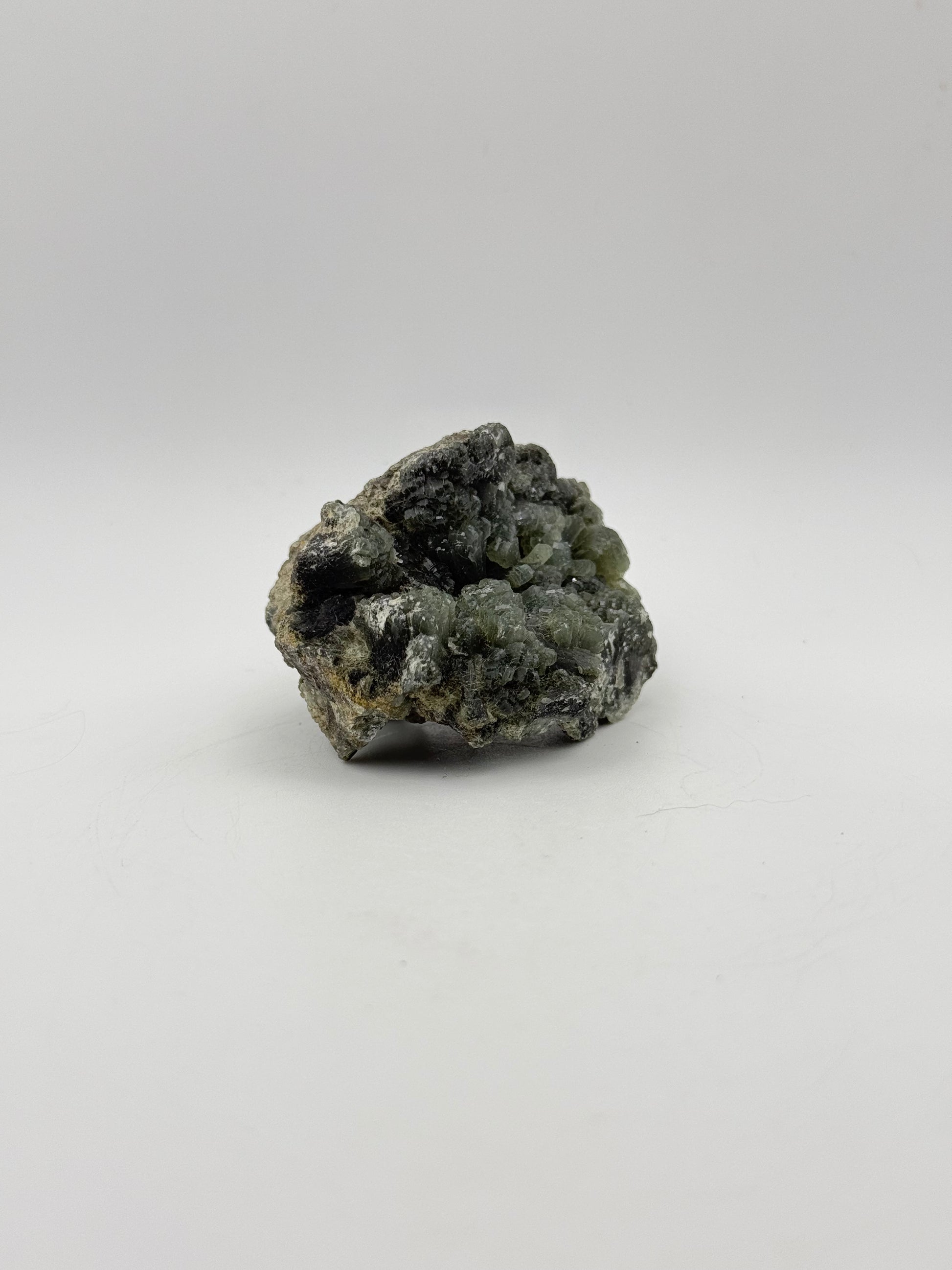 Raw prehnite specimen with amazing green color.