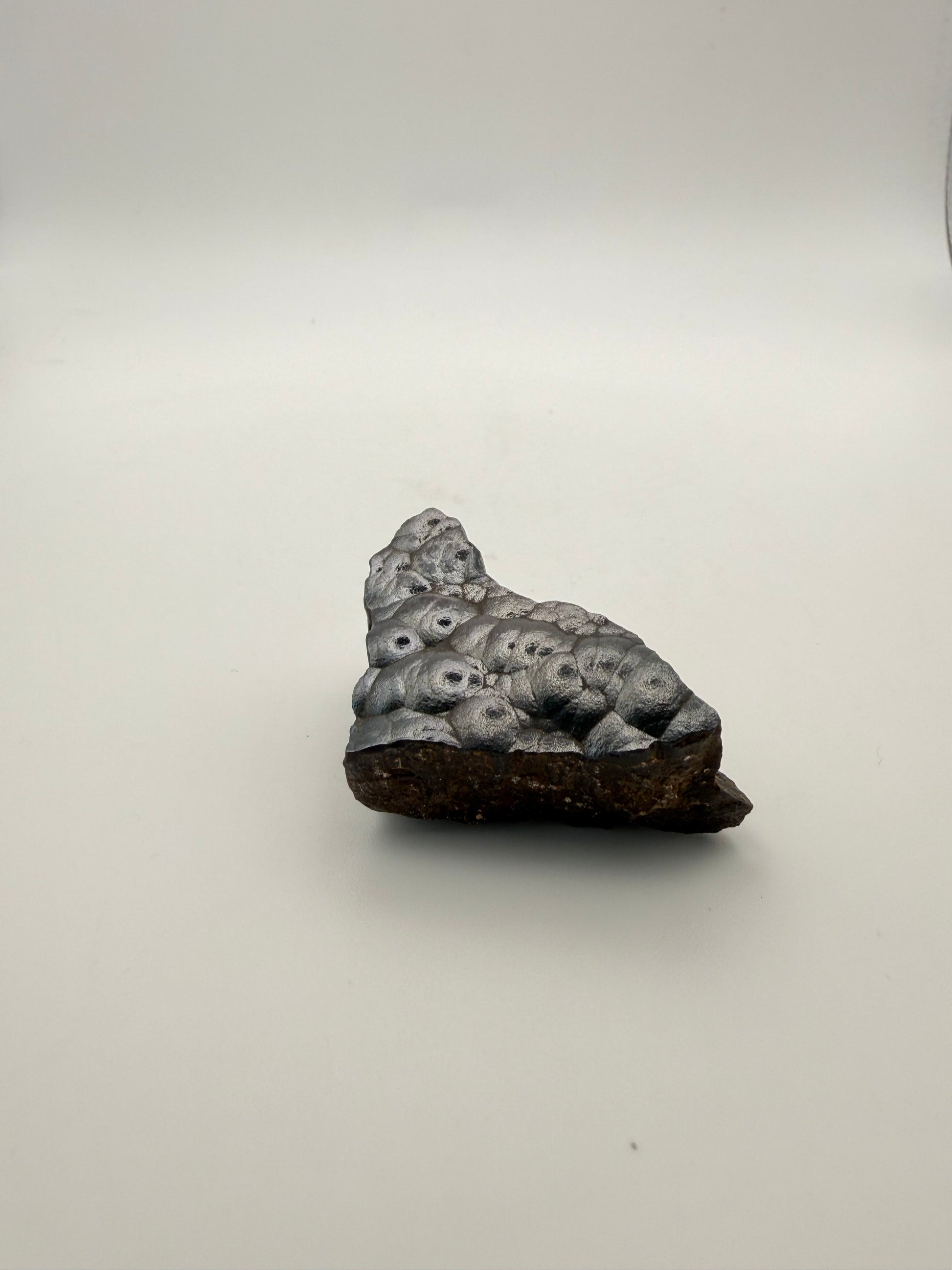 Small raw hematite specimen.
