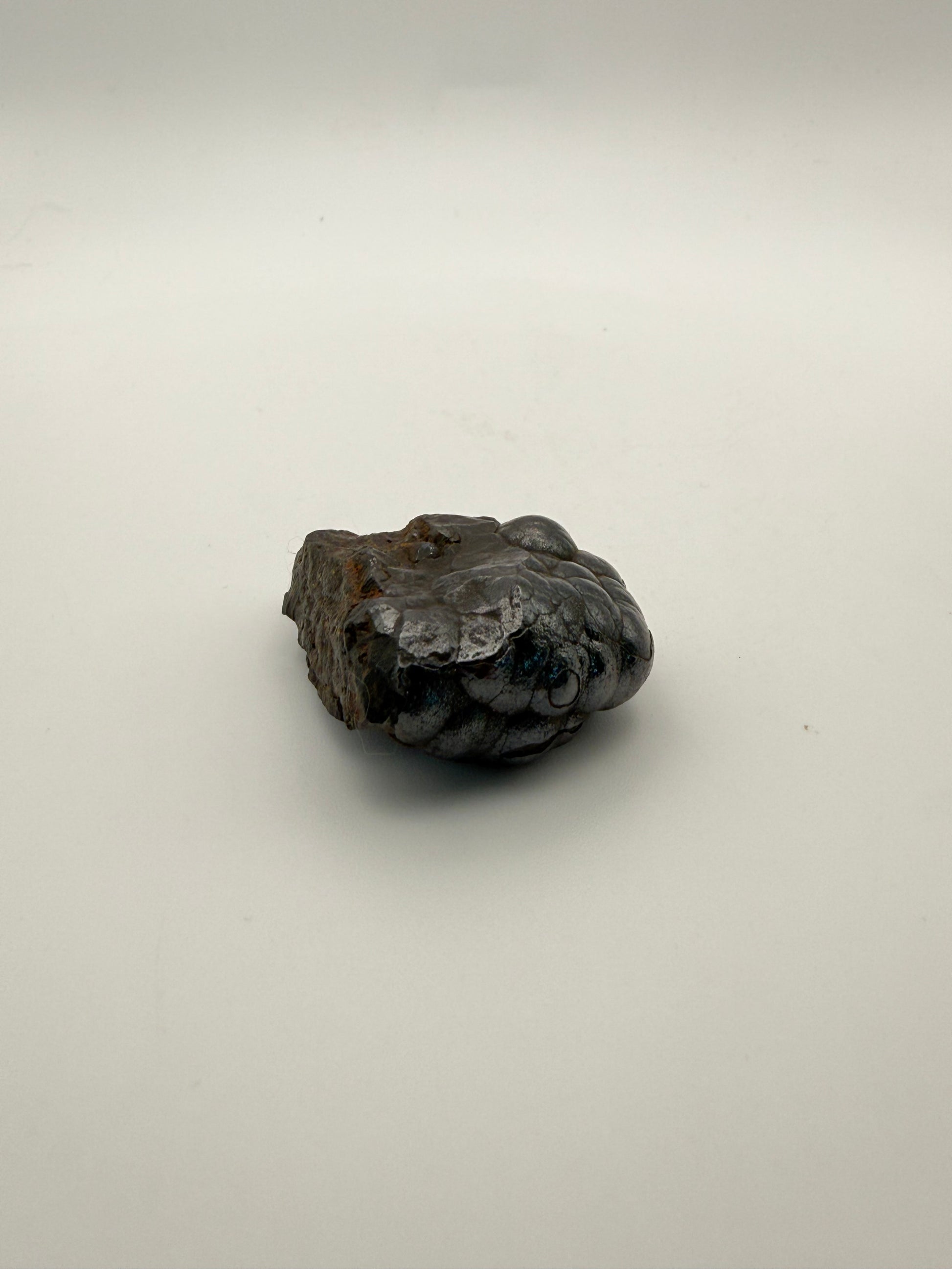 Small raw hematite specimen.
