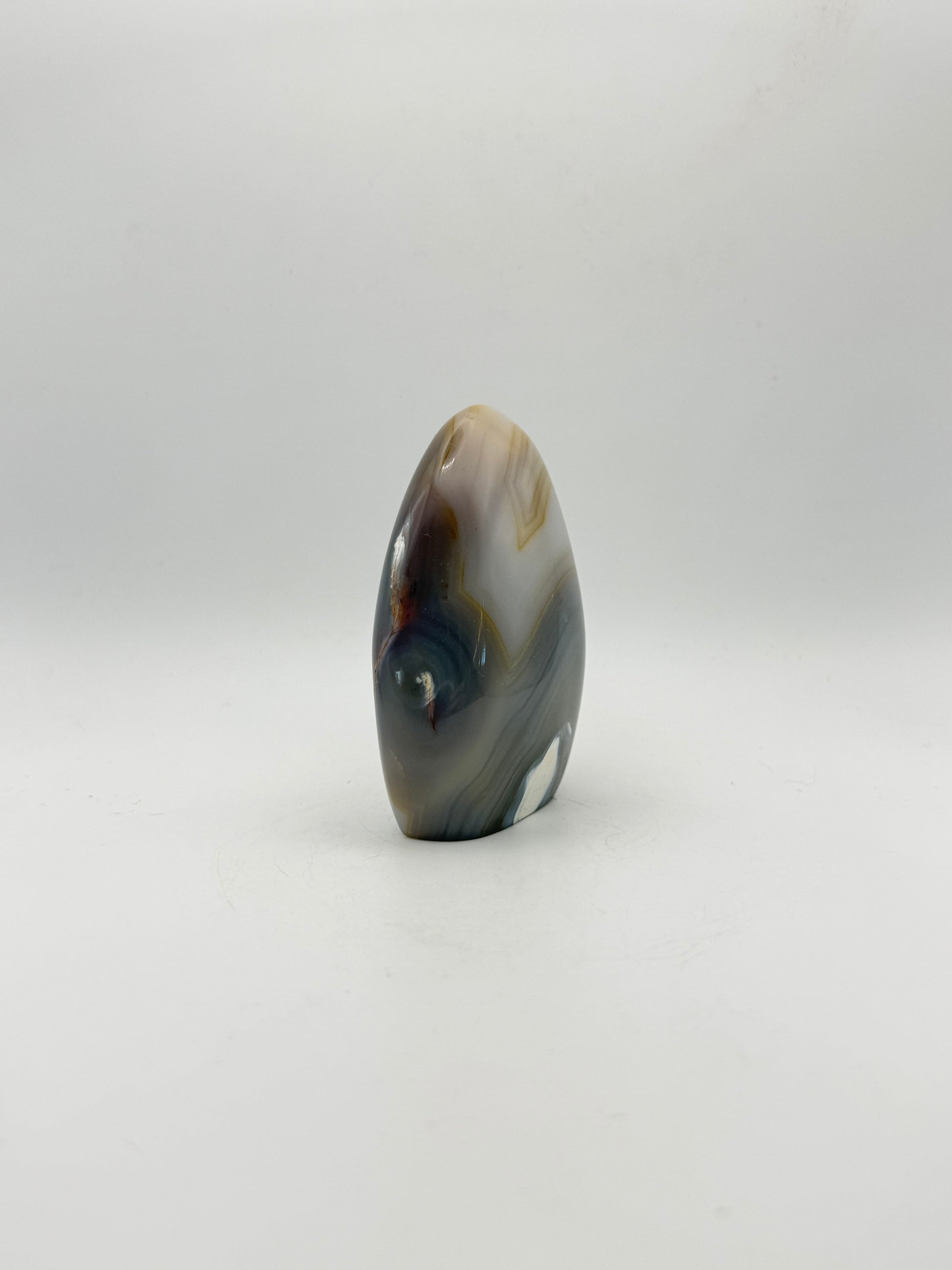 Polished orca agate free form.