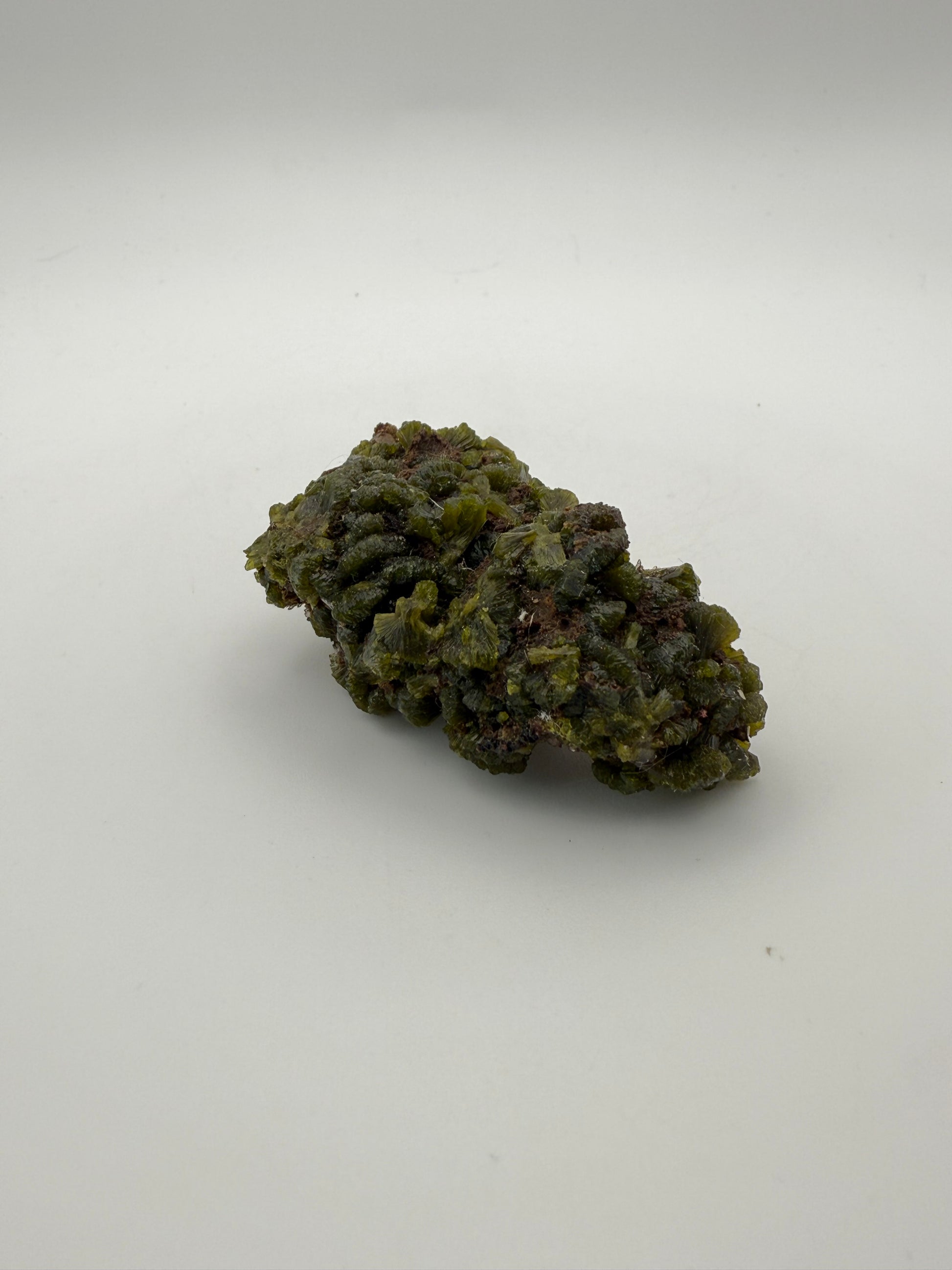 Epidote crystal cluster with good green color.