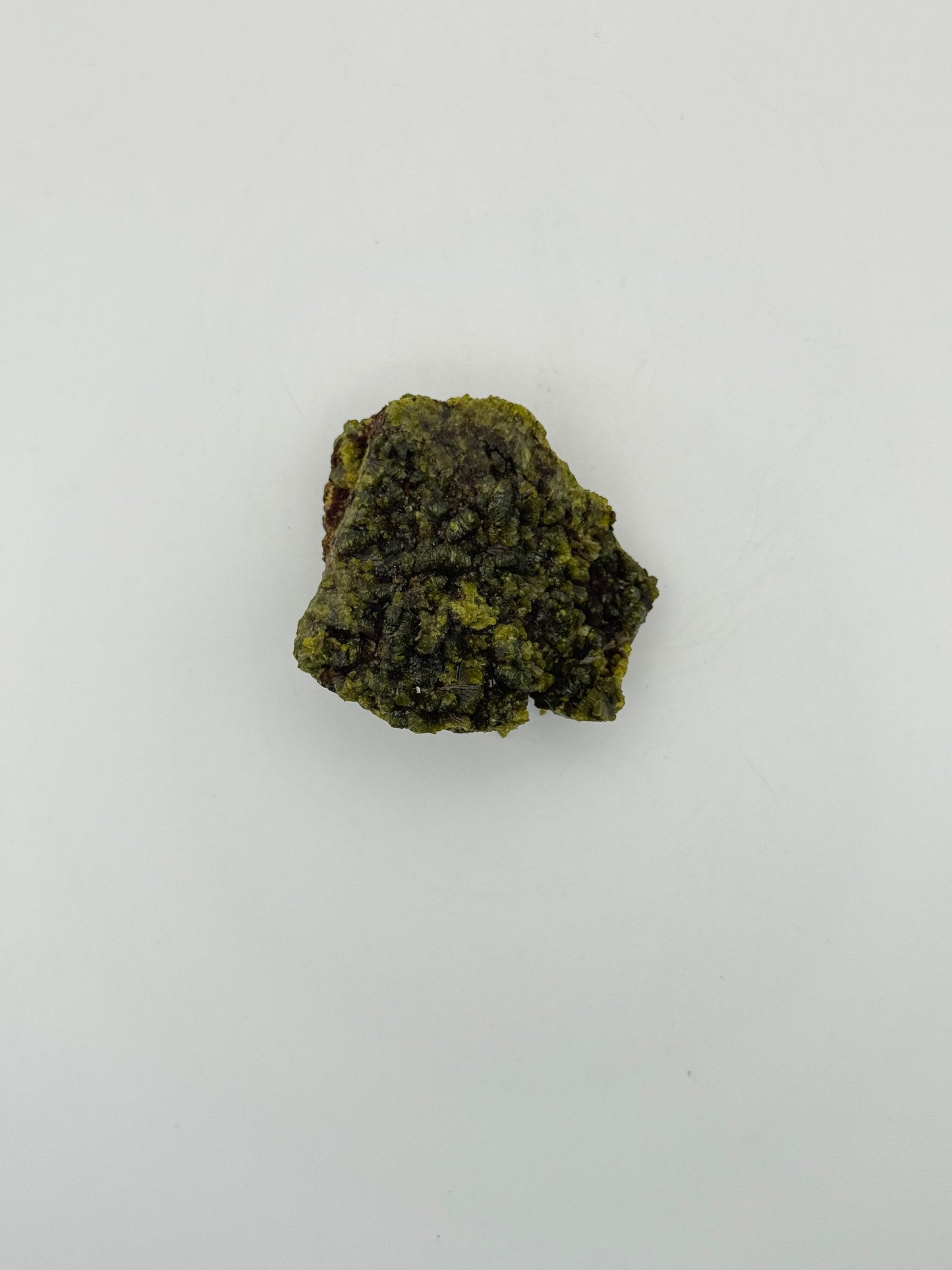 Epidote crystal cluster with good green color.