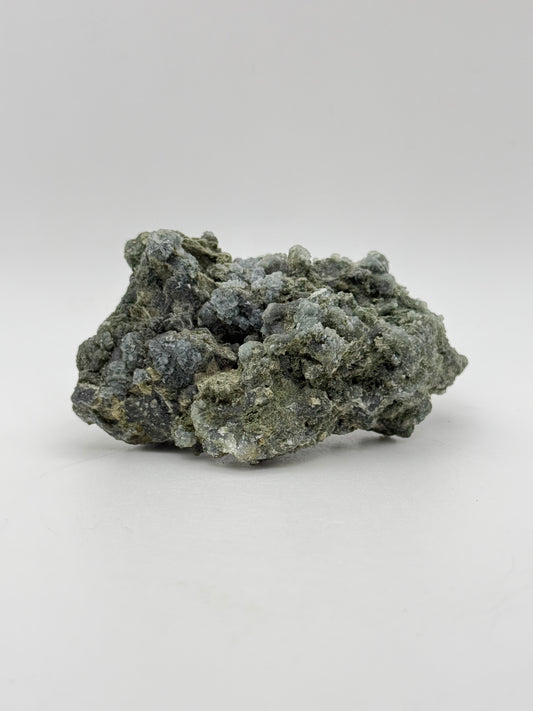 Raw prehnite specimen with amazing green color.