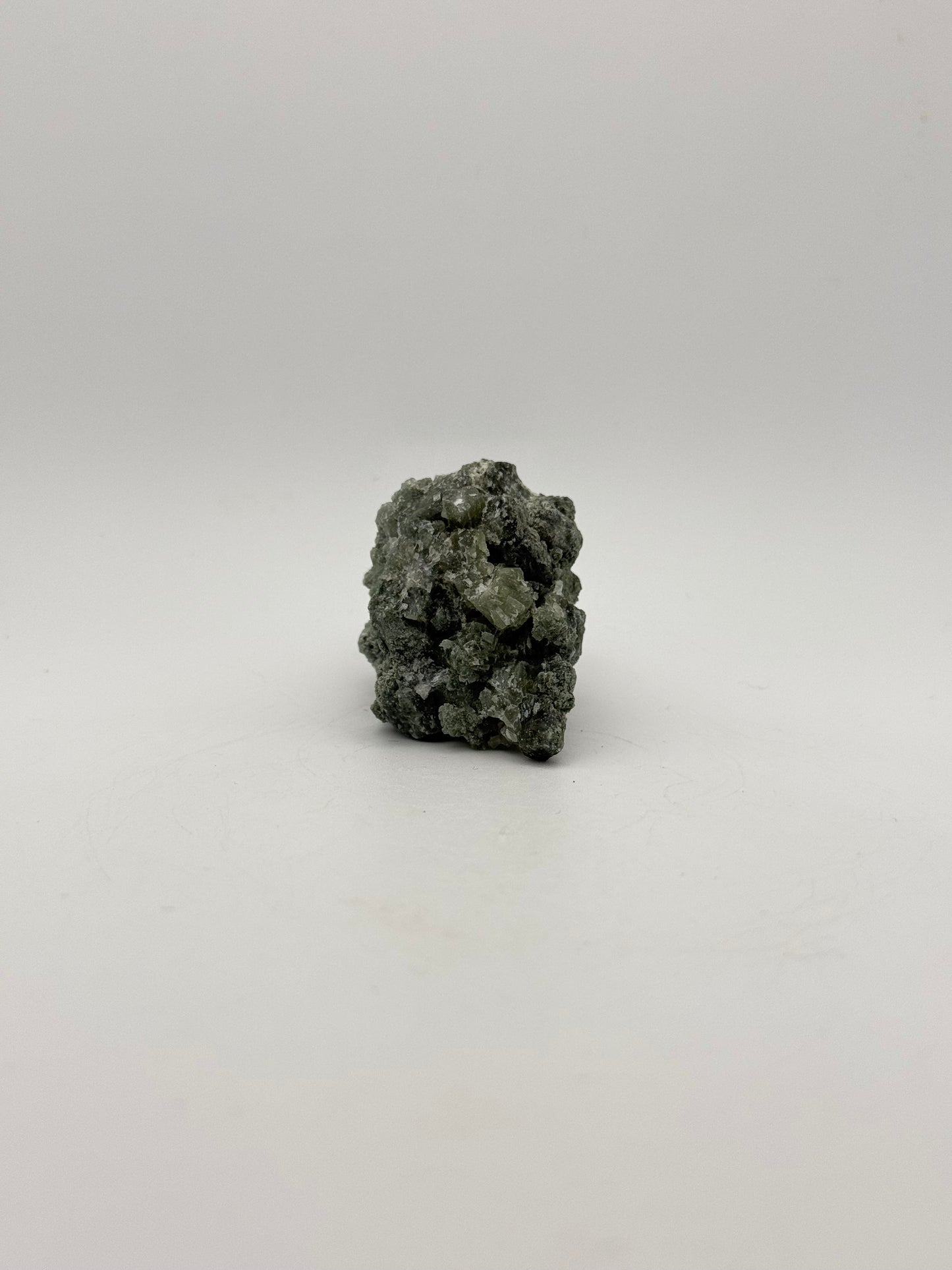 Raw prehnite specimen with amazing green color.