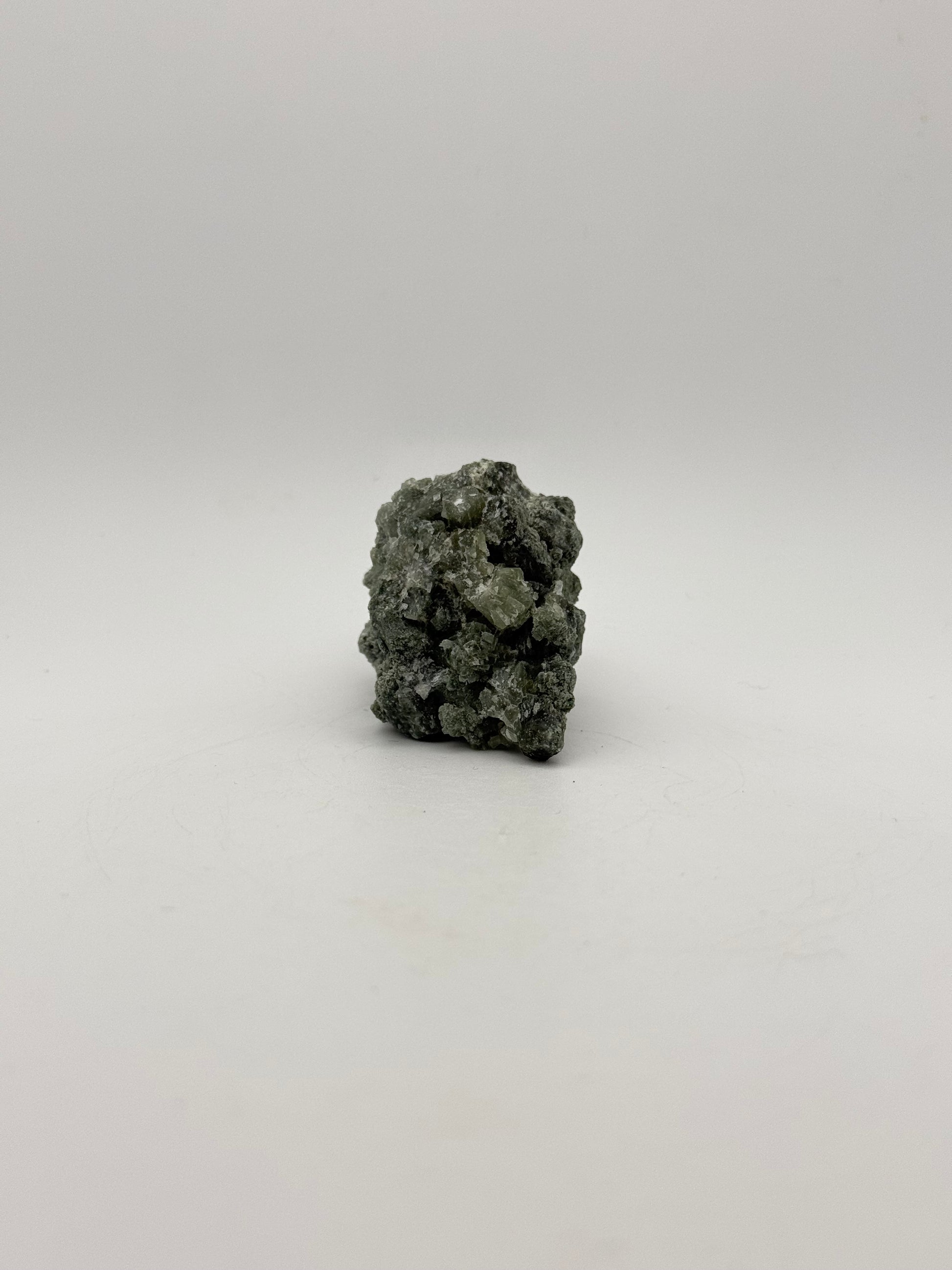 Raw prehnite specimen with amazing green color.