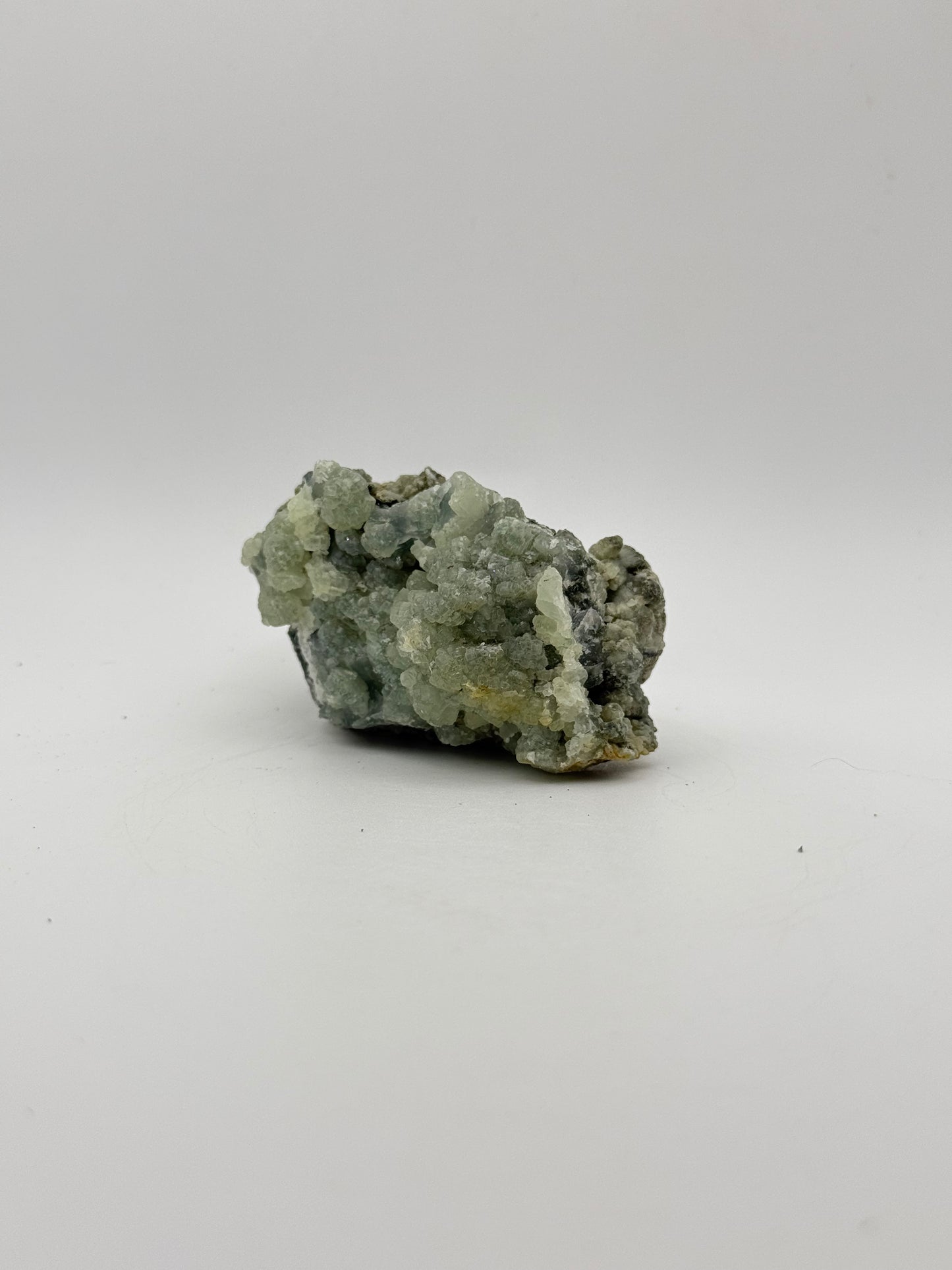 Raw prehnite specimen with amazing green color.