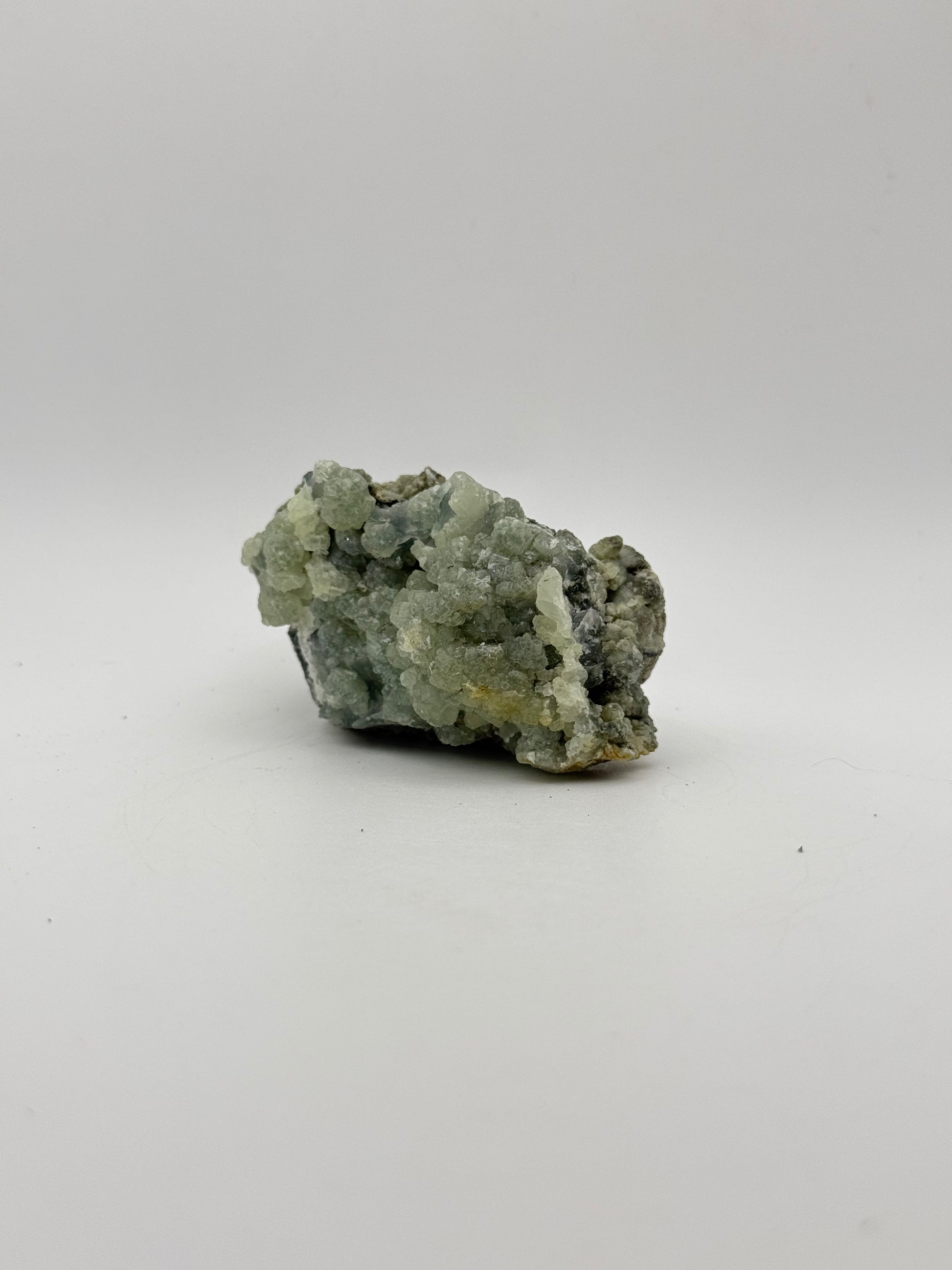 Raw prehnite specimen with amazing green color.