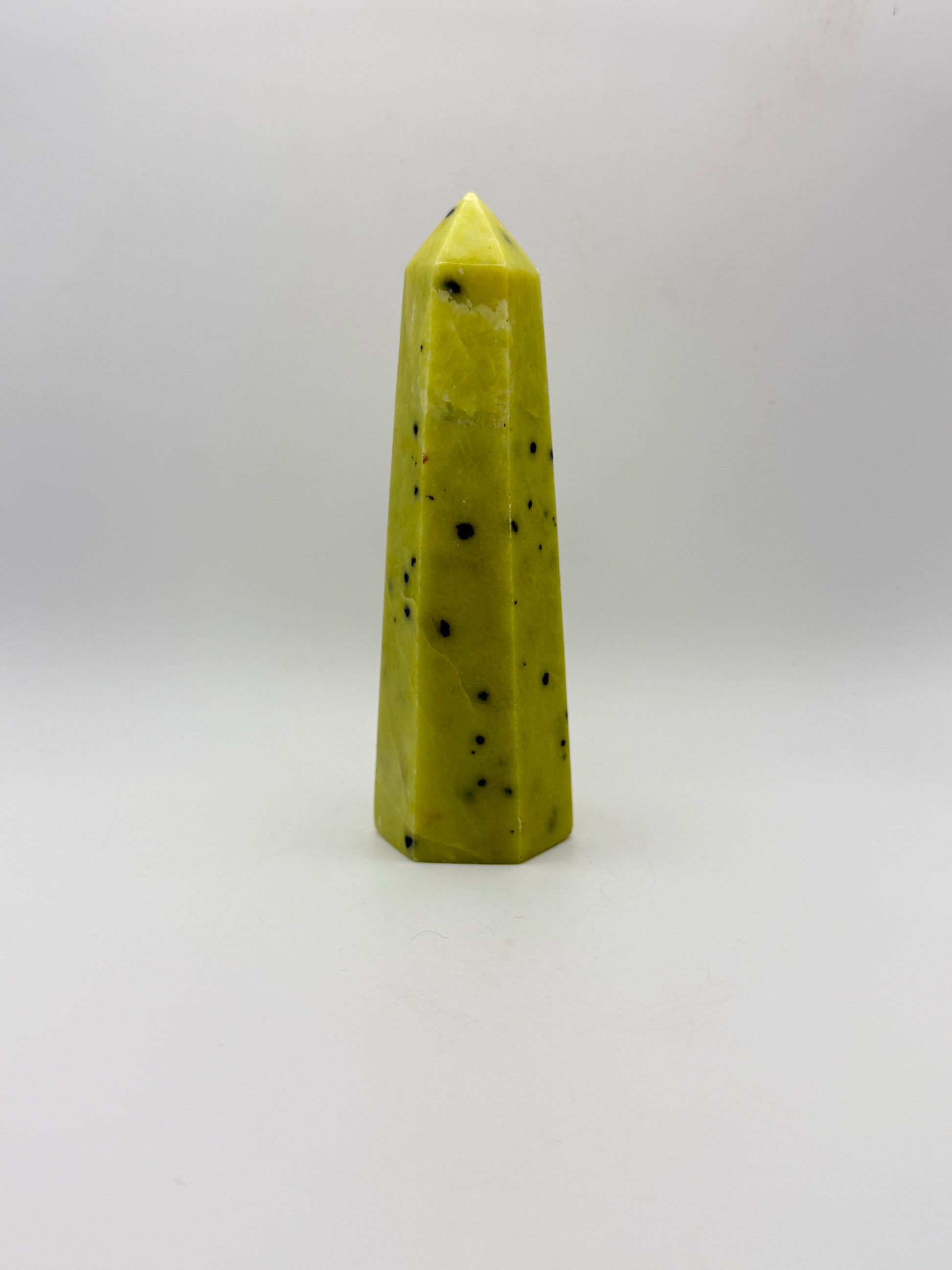 Polished healerite six sided tower.