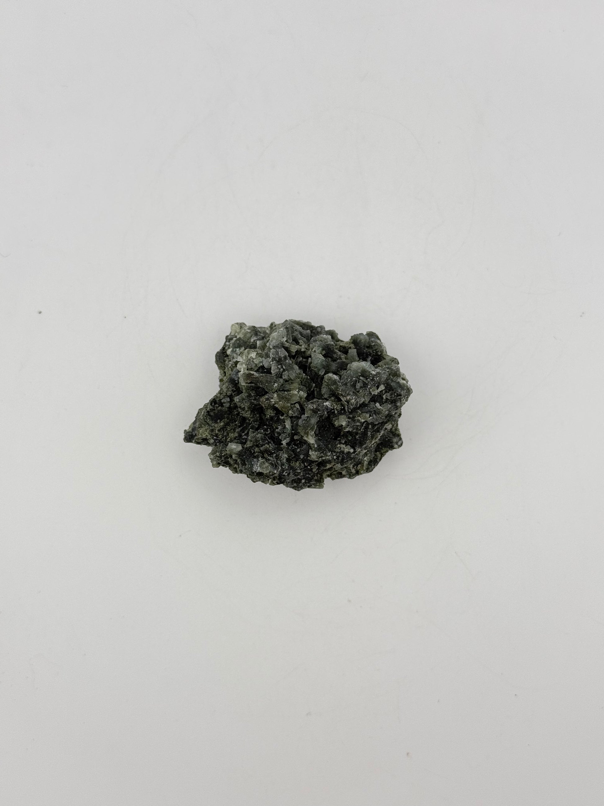 Raw prehnite specimen with amazing green color.