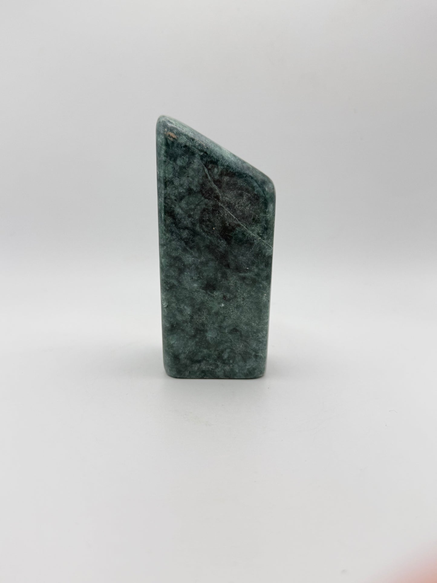 Polished jade free form.