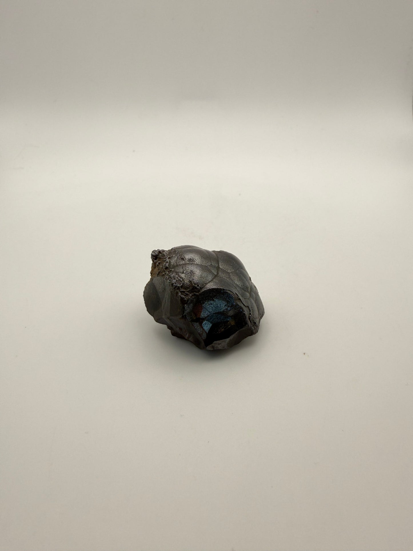 Small raw hematite specimen.
