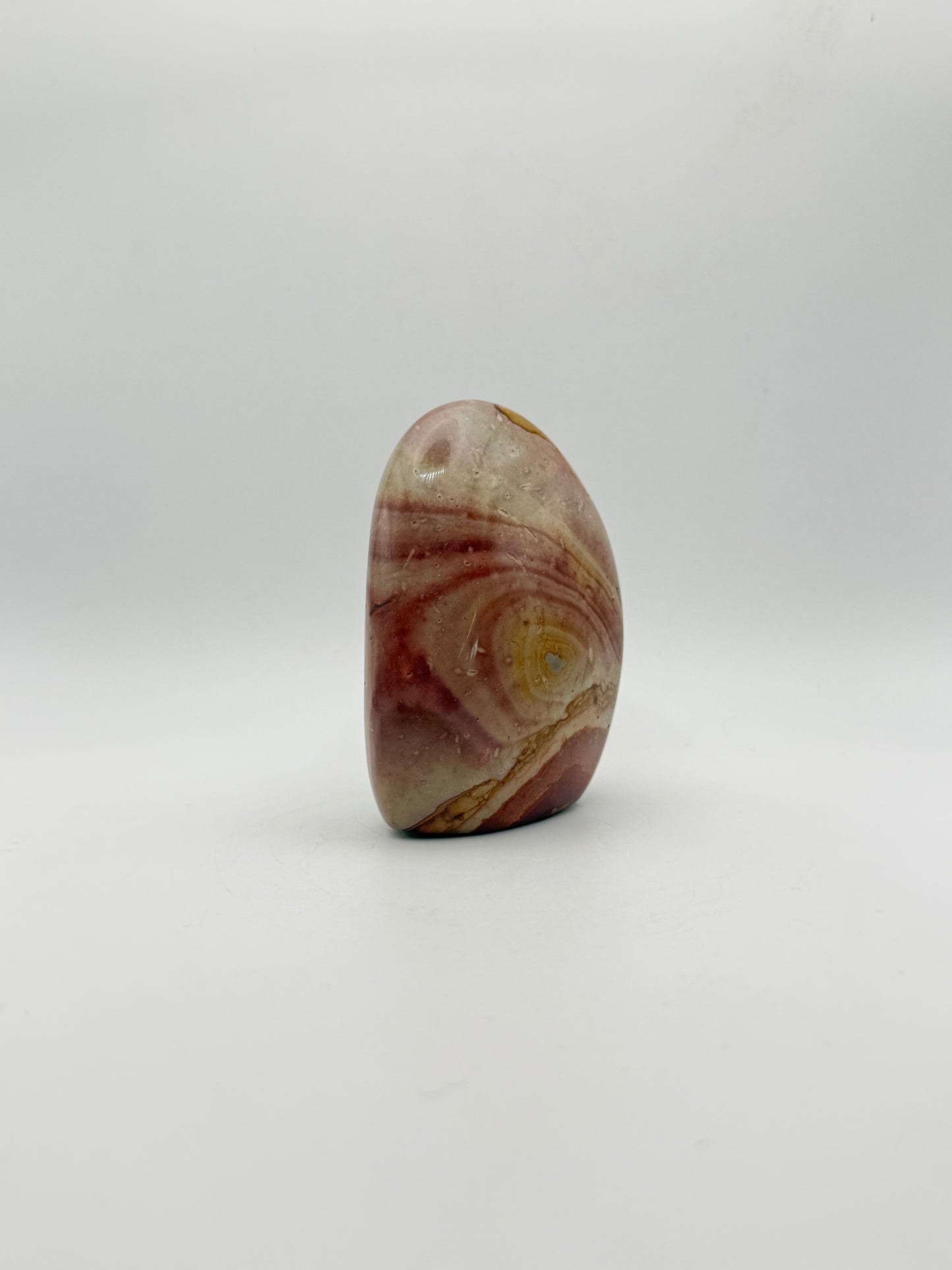 A polished polychrome jasper free from.