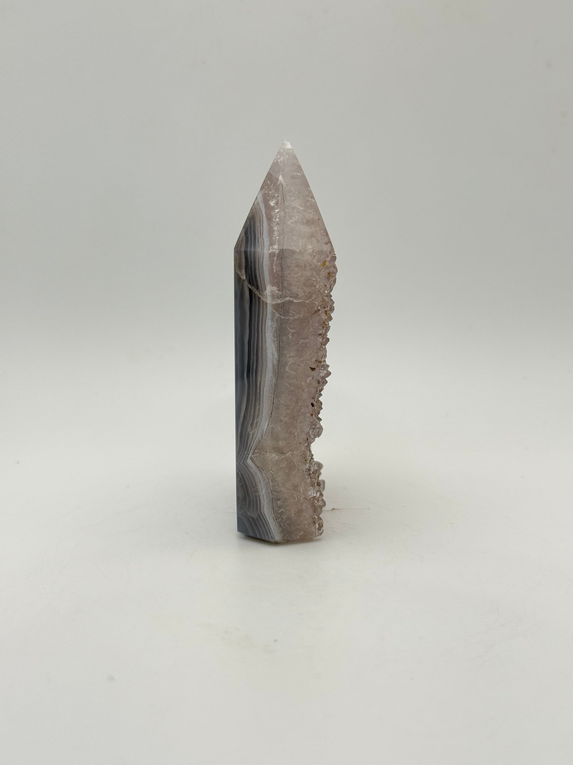 Polished druzy agate tower. About 3.25  inches tall.