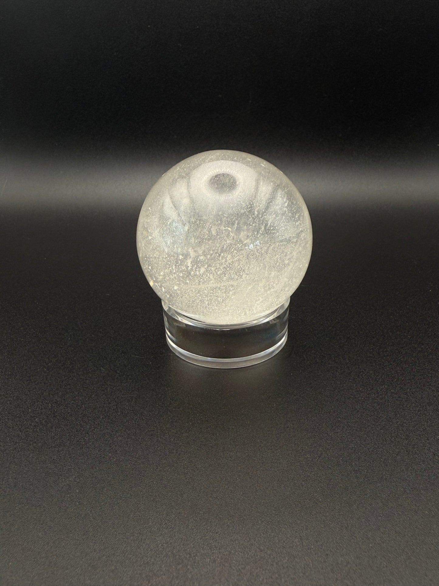 Clear quartz polished crystal sphere.