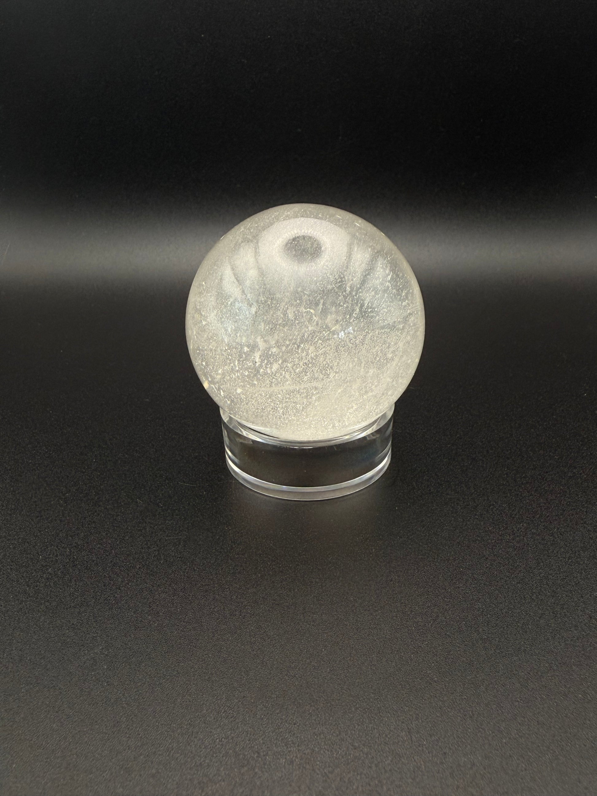 Clear quartz polished crystal sphere.