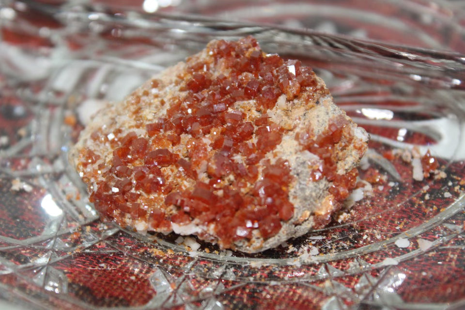 Vanadinite specimen with amazing sparkly red crystal formations.
